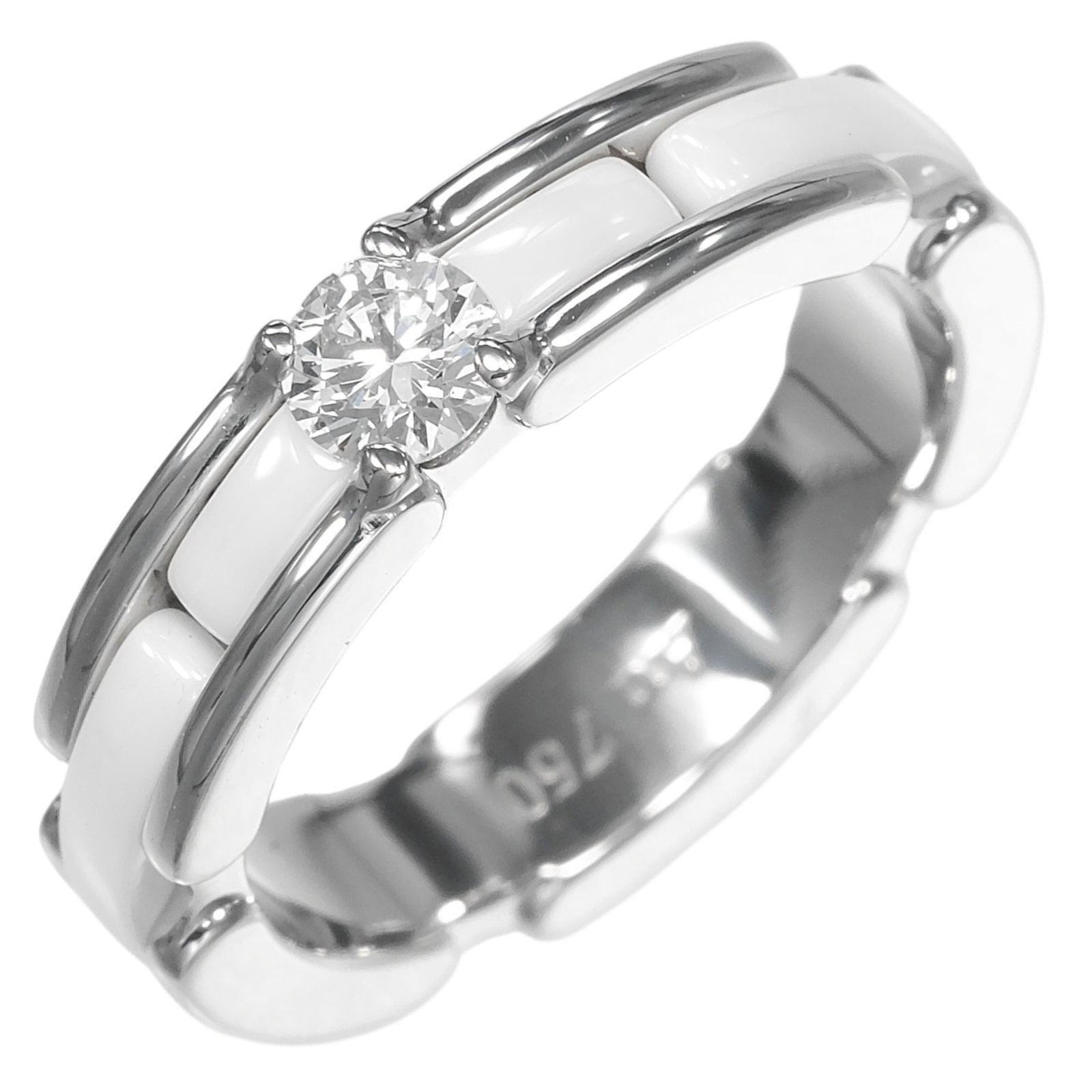 Chanel Band Ring Ceramic, White Gold (18K): Chanel Band Ring Ceramic, White Gold (18K) This 18K white gold band ring from Chanel features a stunning ceramic design and a diamond stone. The ring's inner diameter measures 15.00mm and its width is