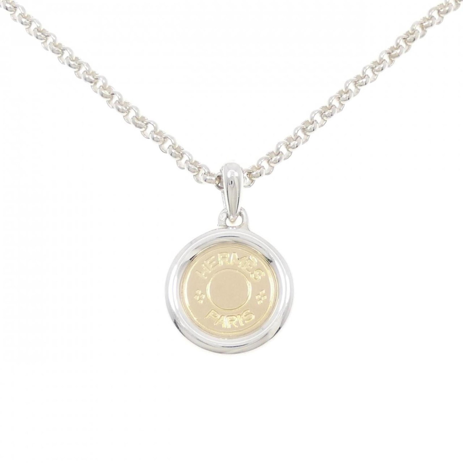 Hermes Serie Necklace: Hermes Serie Necklace The Hermes Serie Necklace boasts elegant silver construction and a sleek design. With a pendant size of 30.8mm x 19.7mm, this necklace features a subtle yet sophisticated look. I