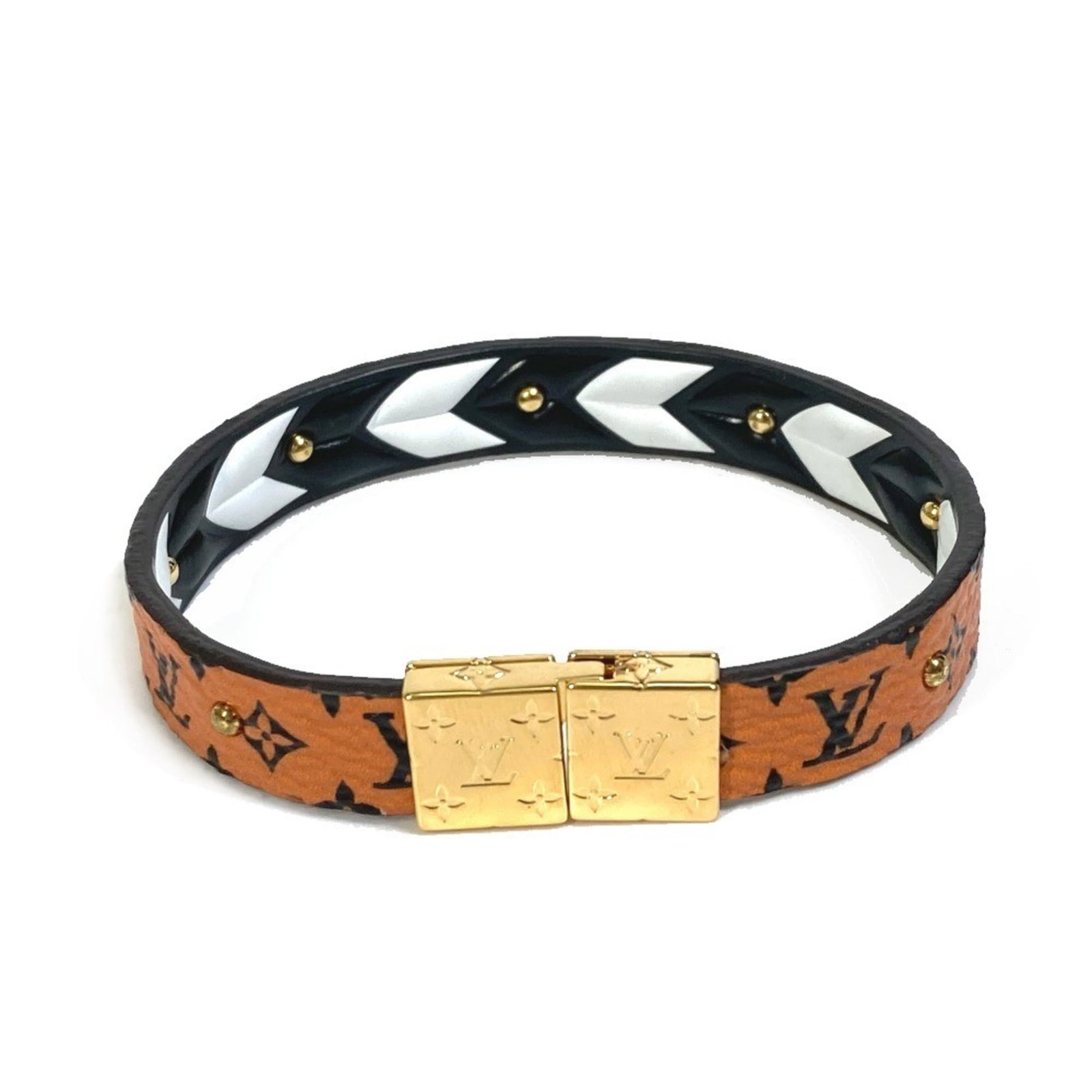 Louis Vuitton Charm Bracelet Monogram: Louis Vuitton Charm Bracelet Monogram Black, Brown, and White Monogram Charm Bracelet from Louis Vuitton. This 15.5cm charm bracelet features the iconic monogram pattern in three colors, with a total 