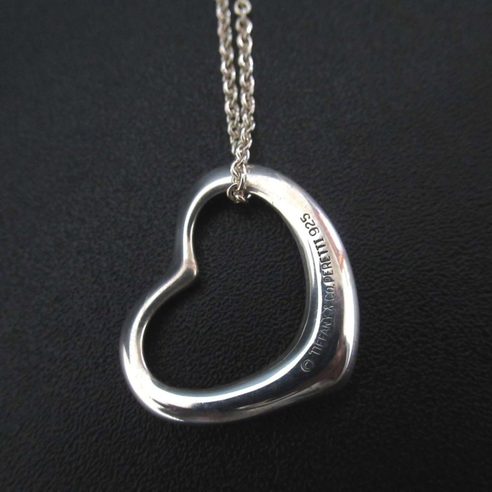 Tiffany & Co. Elsa Peretti Open Heart Necklace Pendant in 925 SV Silver for Women: Tiffany & Co. Elsa Peretti Open Heart Necklace Pendant in 925 SV Silver for Women Tiffany & Co.'s Elsa Peretti Open Heart Necklace Pendant in 925 SV Silver is a timeless piece of jewelry. This