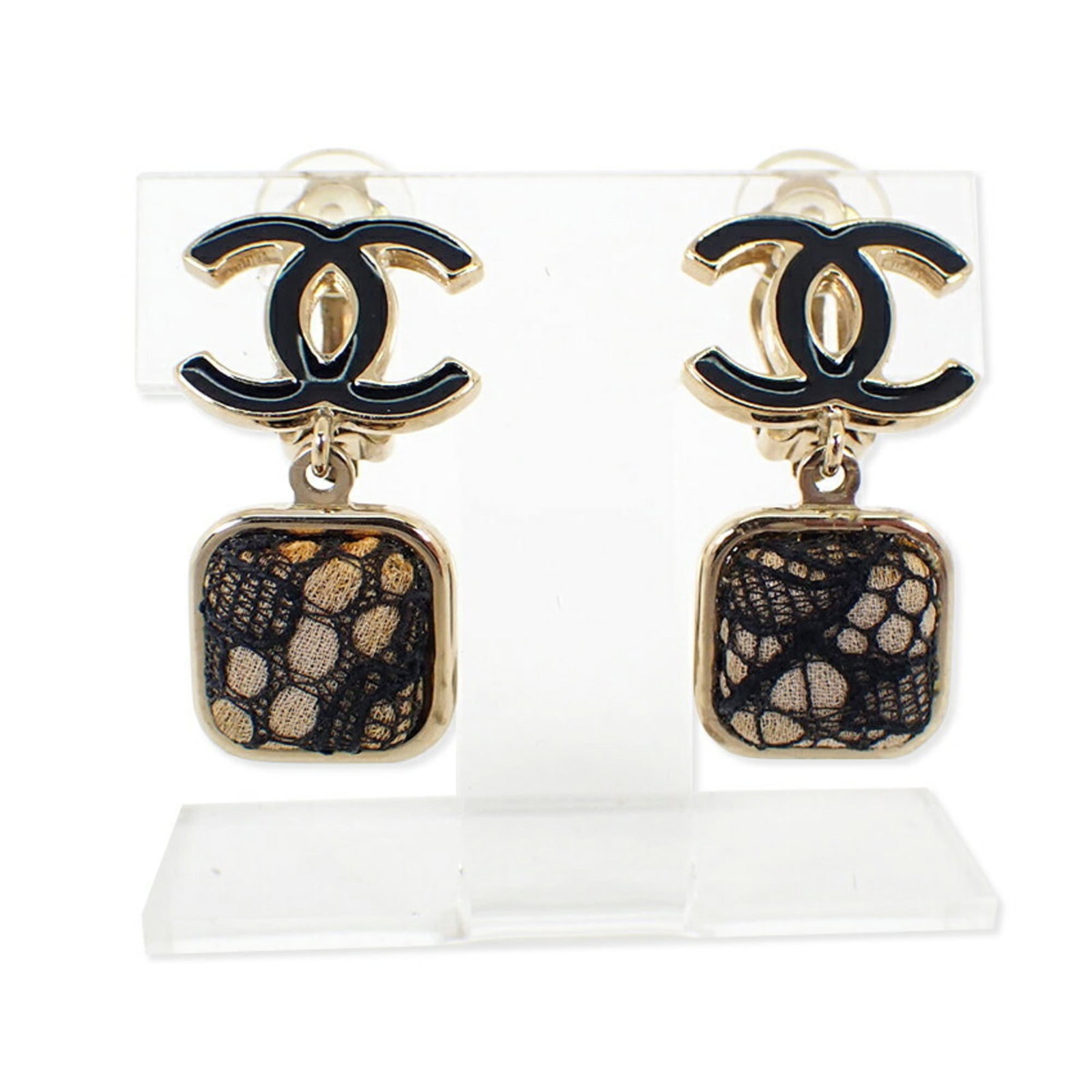 Chanel Clip Earrings Gold Plating: Chanel Clip Earrings Gold Plating Chanel's iconic clip earrings shine in gold plating, adding a touch of luxury to any outfit. With their sleek design and durable construction, these earrings are a