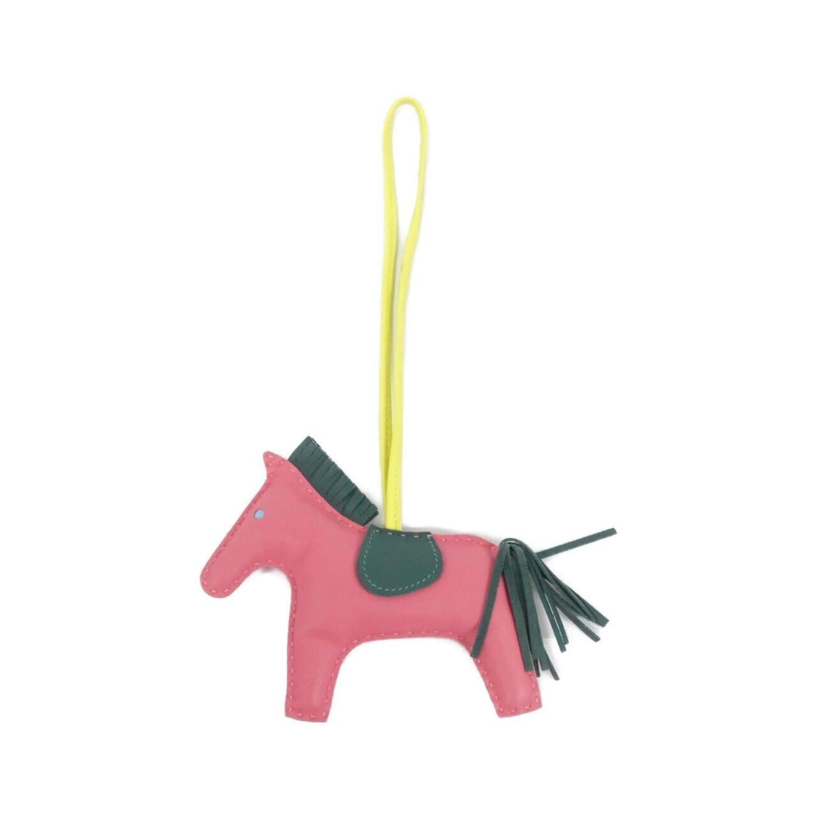 Hermes Handbag Charm Agneau Milo: Hermes Handbag Charm Agneau Milo Agneau Milo Handbag Charm from Hermes features a striking pink hue, adding a pop of color to any outfit. With its 360mm chain length and 100x130mm size, this charm can