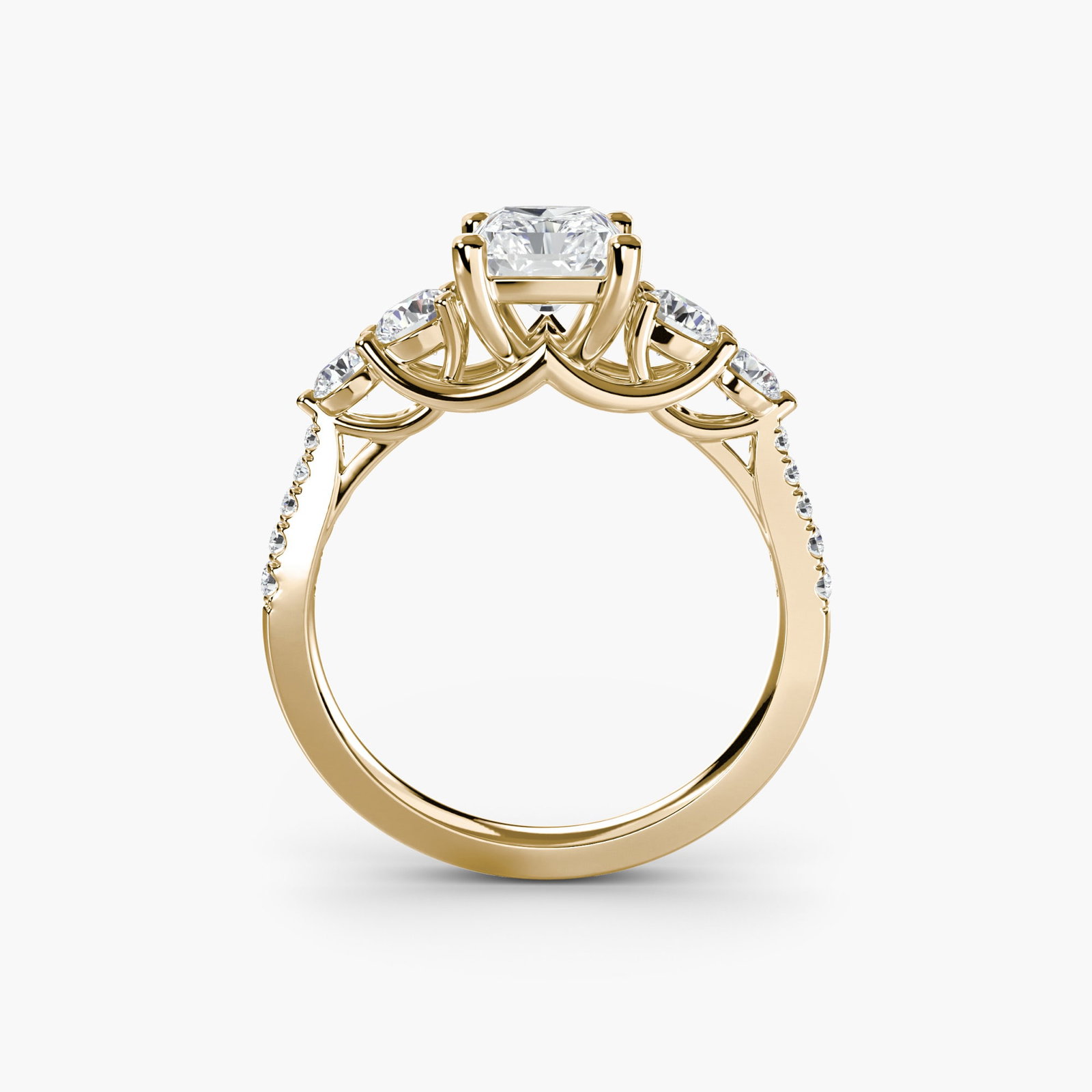 Pave Radiant 14Kt Yellow Gold Ring Setting: Pave Radiant 14Kt Yellow Gold Ring Setting Radiant pave setting in 14Kt yellow gold, featuring 14 side stones totaling 0.595 carats of lab-grown EF/VS color and clarity. The ring's metal weight is