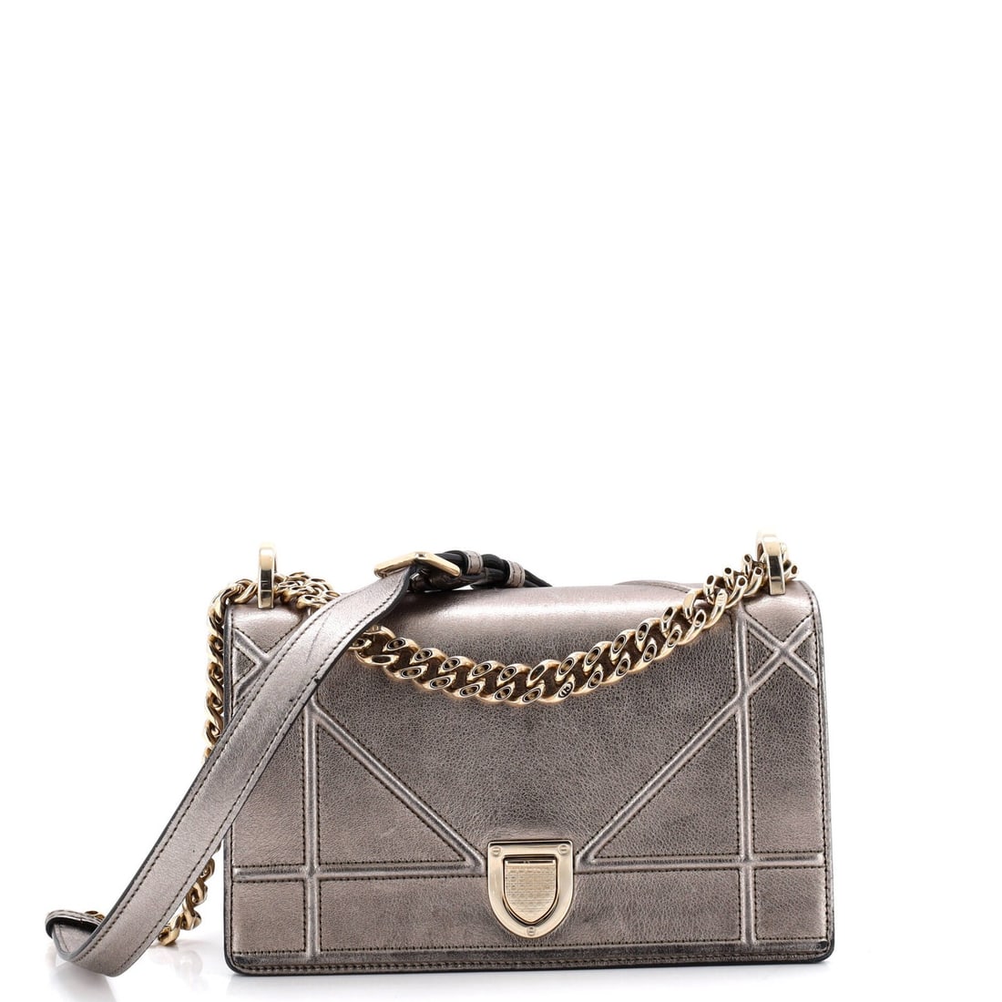 Christian Dior Flap Small Lambskin Bag: Christian Dior Flap Small Lambskin Bag The Christian Dior Flap Small Lambskin Bag boasts a striking metallic exterior with gold tone hardware. This iconic cross-body bag features a classic design with