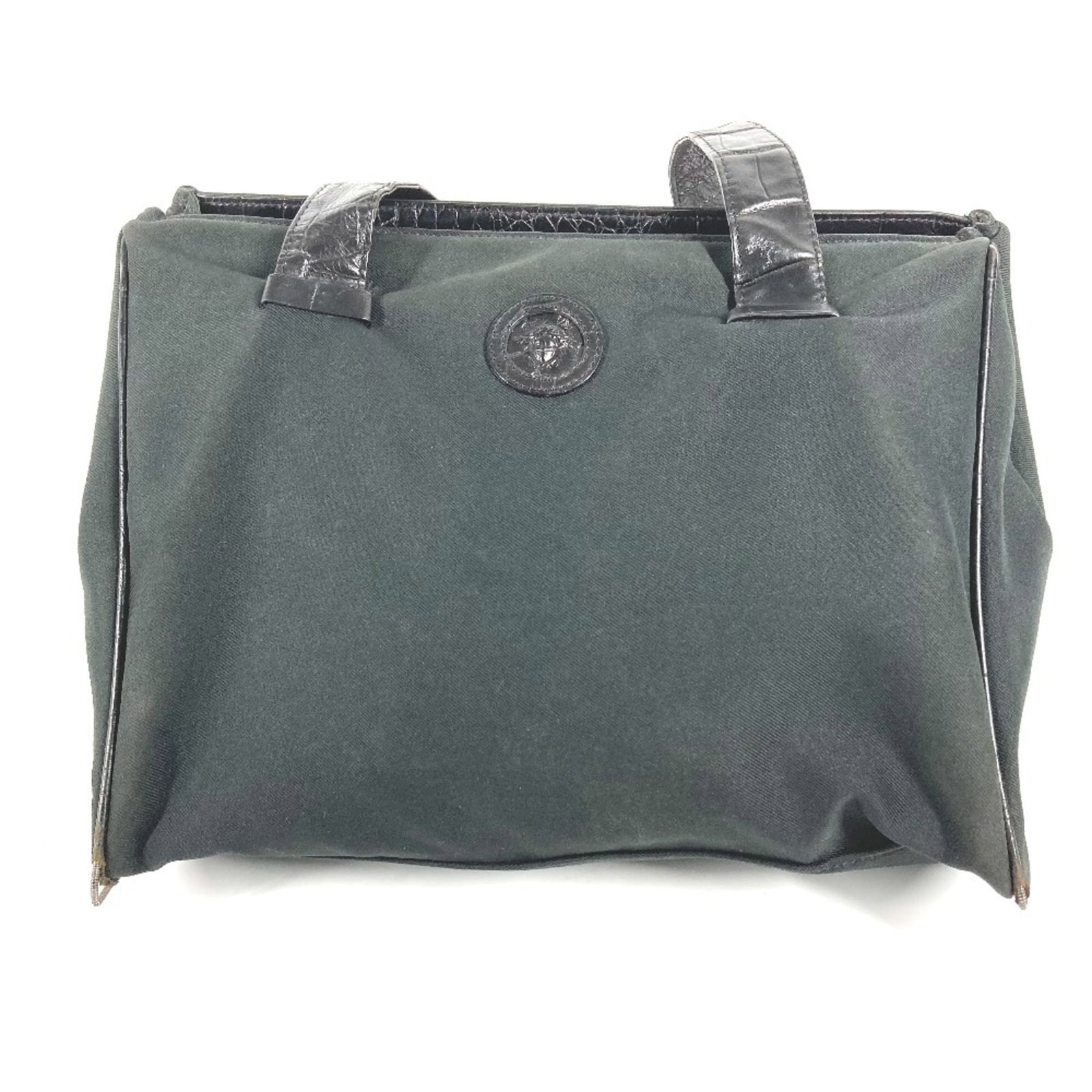 Versace Shoulder Bag Tote Bag Canvas Leather: Versace Shoulder Bag Tote Bag Canvas Leather Versace's iconic shoulder bag tote combines sleek canvas and embossed leather for a chic, sophisticated look. Measuring 23.5cm x 32cm x 15.5cm, this