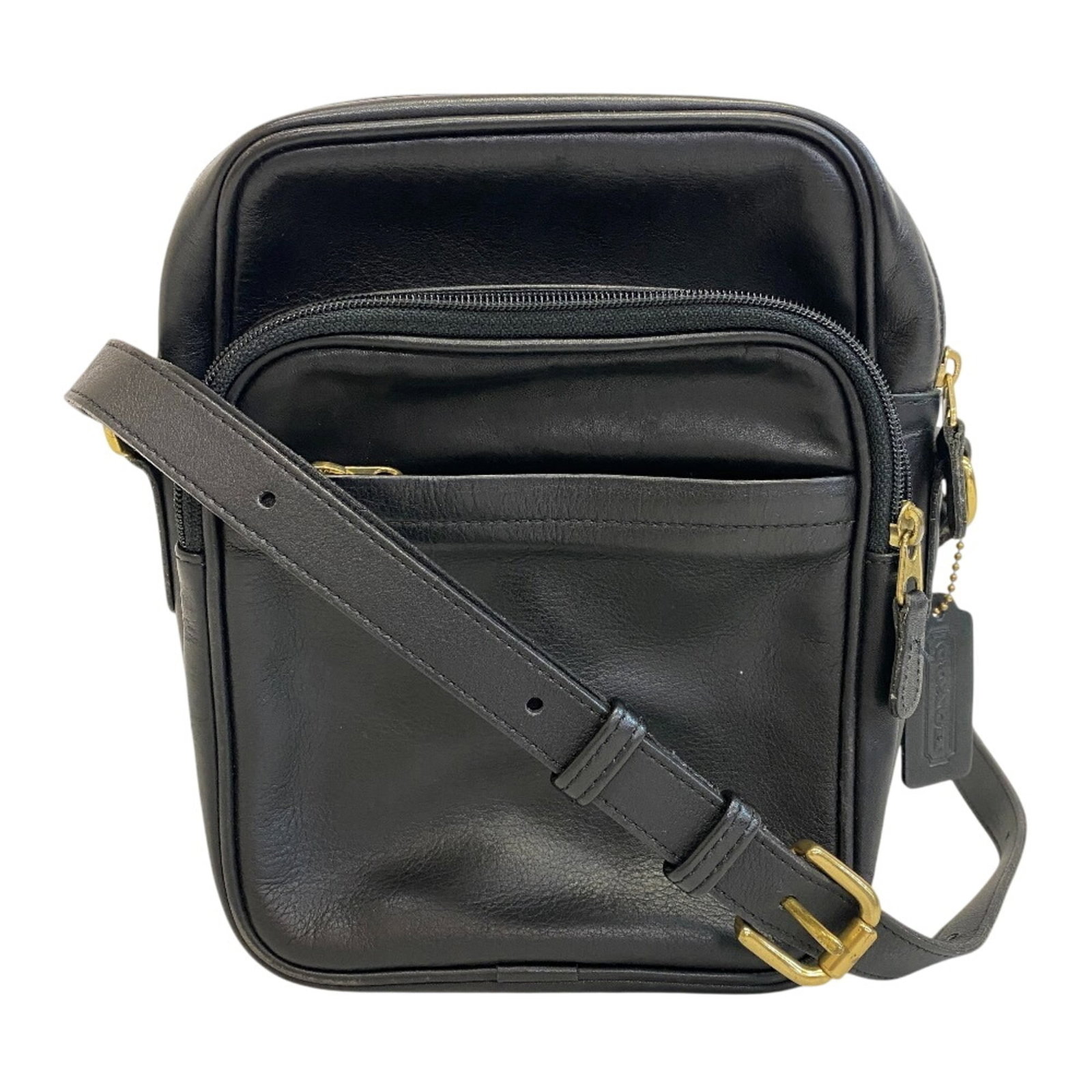 Coach Pochette Shoulder Bag Leather: Coach Pochette Shoulder Bag Leather The Coach Pochette Shoulder Bag Leather offers a sleek and sophisticated design with its classic black leather exterior. With dimensions of 23cm x 20cm x 5cm, this 