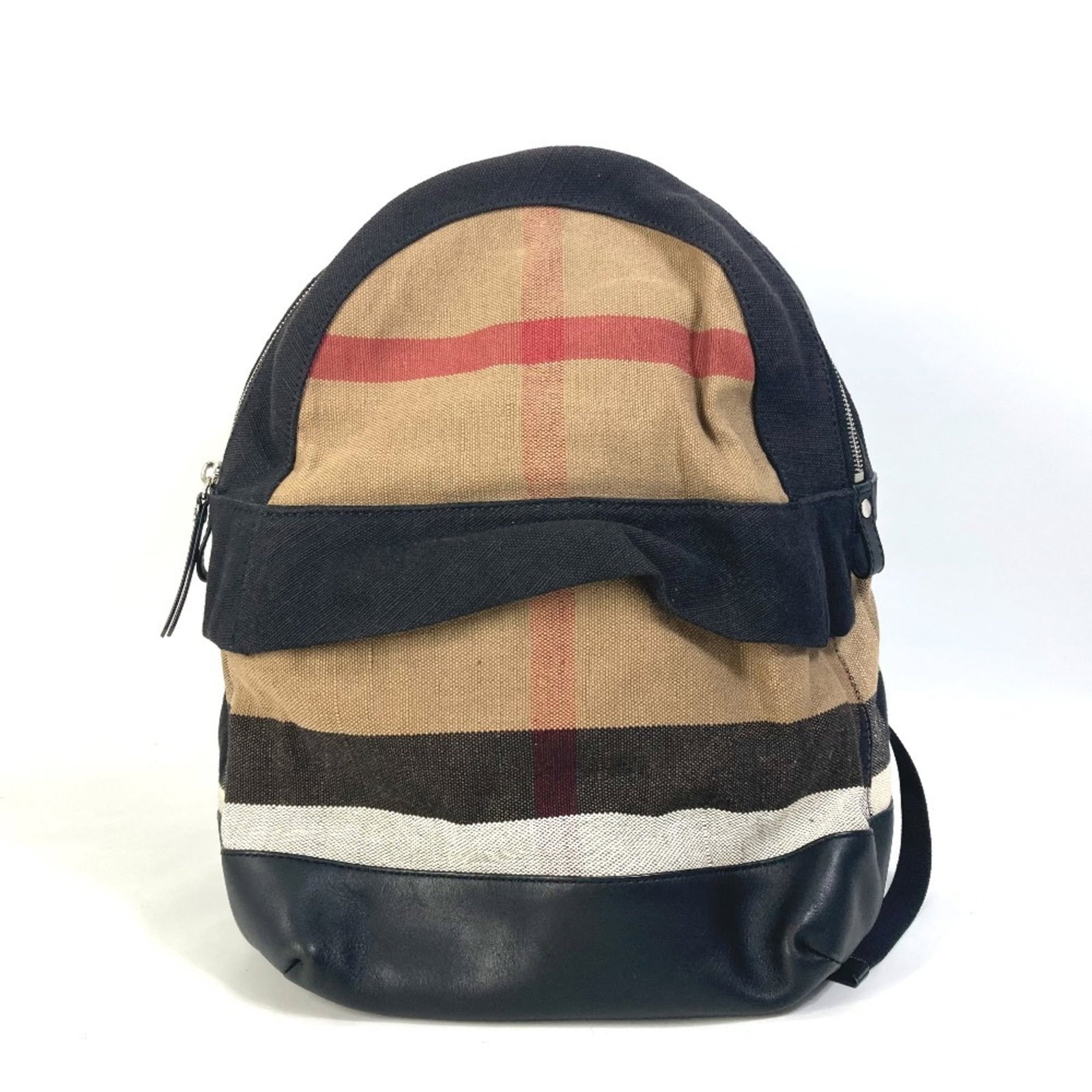 Burberry Backpack Canvas Leather: Burberry Backpack Canvas Leather Canvas and leather blend in this classic Burberry backpack, available in beige and black. Measuring 38cm x 28.5cm x 16cm, its used condition shows signs of wear with s