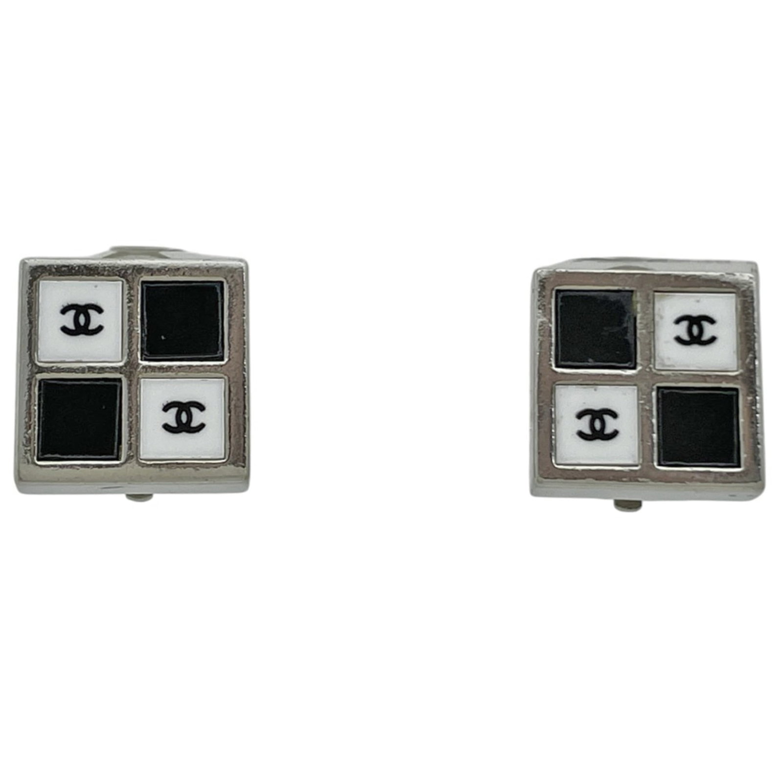 Chanel Clip Earrings: Chanel Clip Earrings Chanel Clip Earrings are a sleek and sophisticated accessory featuring a silver plated finish in black, white, and silver hues. Measuring 15mm x 15mm, these earrings showcase a cl