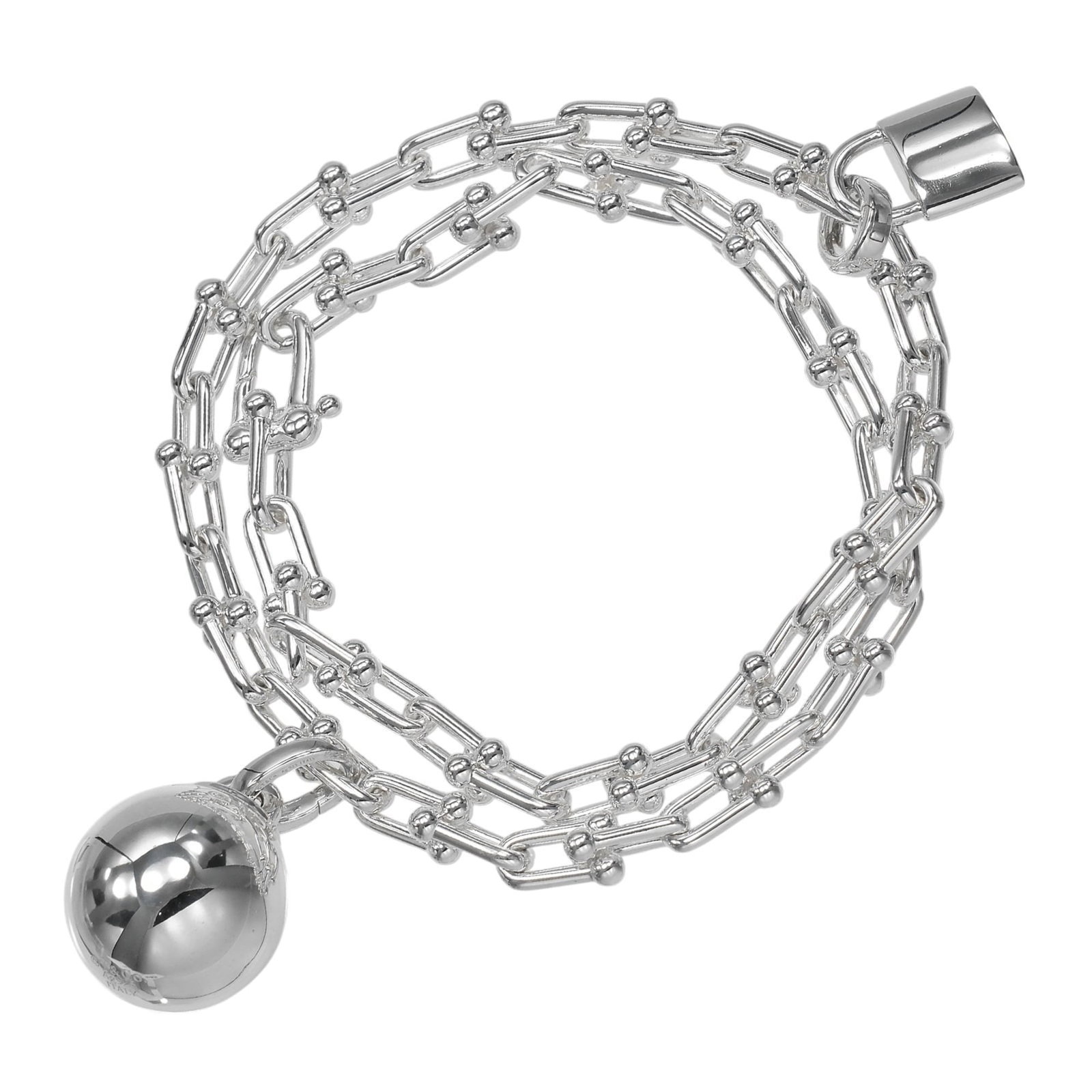 Tiffany Charm Bracelet Silver 925: Tiffany Charm Bracelet Silver 925 Silver 925 Tiffany Charm Bracelet with a sleek and modern design, measuring 17cm in length. This like-new charm bracelet boasts hardly any signs of usage, making it a