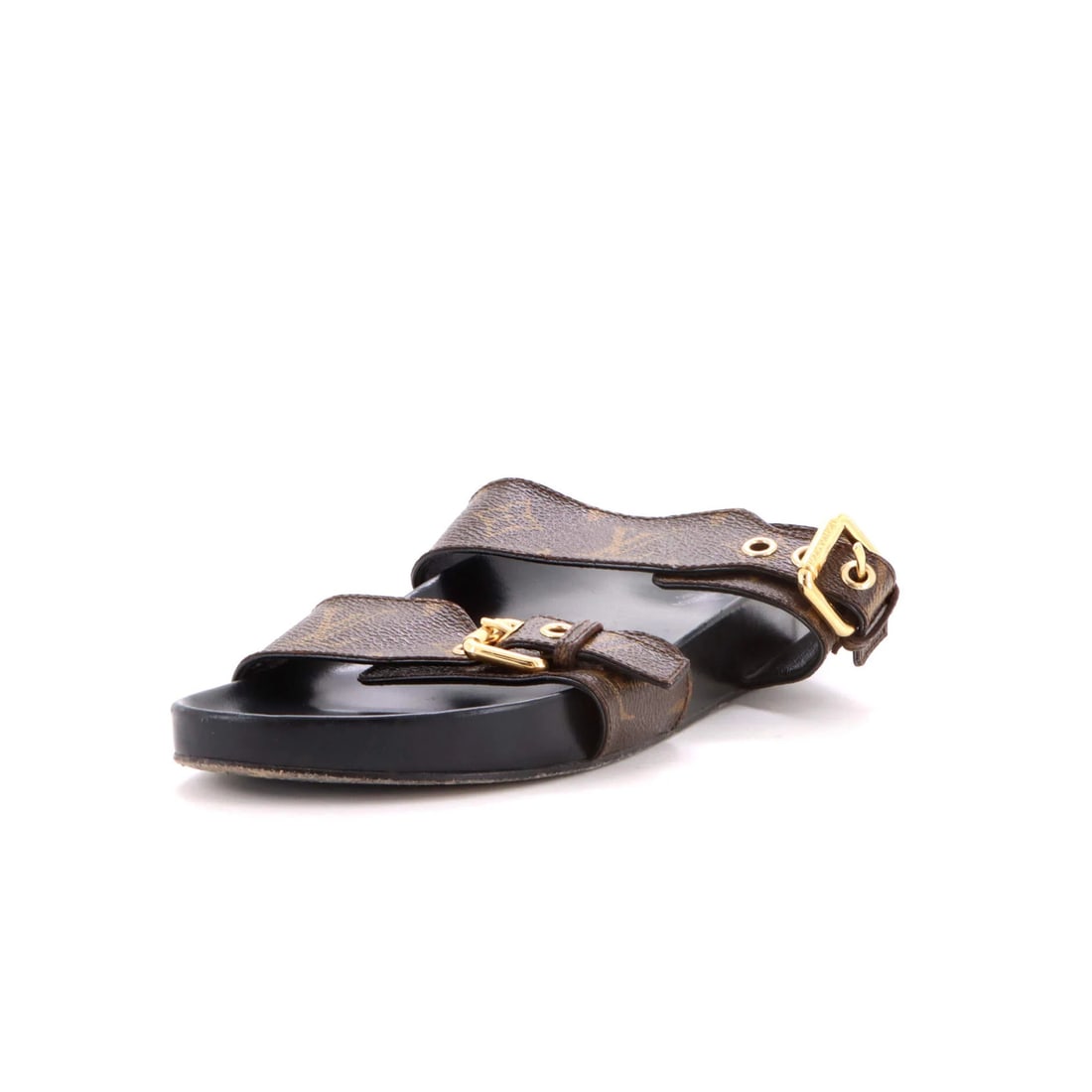 Monogram Canvas Women's Mules Flat Bom Dia Louis Vuitton: Monogram Canvas Women's Mules Flat Bom Dia Louis Vuitton Canvas Coated Monogram Women's Mules Flat Bom Dia Louis Vuitton in Brown. This classic flat mule features canvas exterior with leather interior