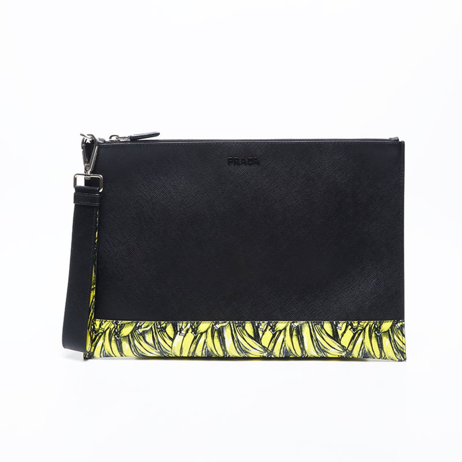 Prada Clutch Bag: Prada Clutch Bag The Prada Clutch Bag is a sleek and sophisticated accessory in black, measuring 23cm x 35cm x 1cm. With its compact size and subtle design, this clutch bag is perfect for adding a tou