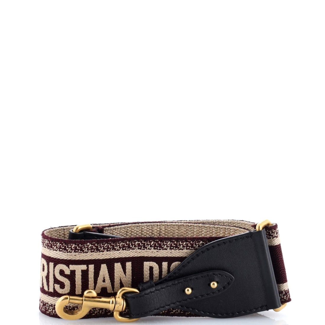 Christian Dior logo canvas embroidered shoulder strap: Christian Dior logo canvas embroidered shoulder strap The Christian Dior logo canvas embroidered shoulder strap boasts a sleek black exterior with subtle neutral and red accents. Its high-quality canv