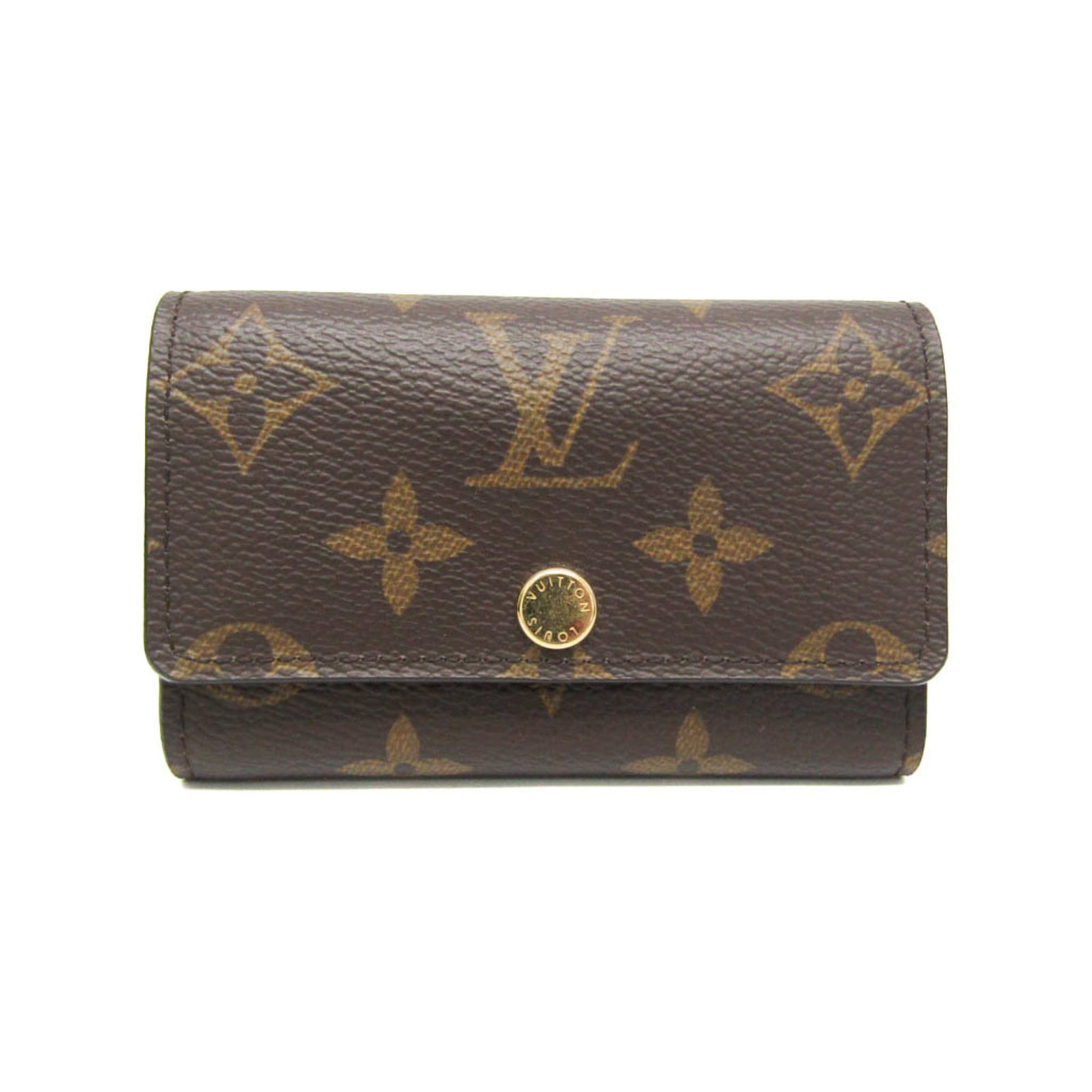 Louis Vuitton Keycase Monogram: Louis Vuitton Keycase Monogram Monogrammed for style and functionality, this Louis Vuitton Keycase features a classic snap closure and six key hooks. The iconic monogram pattern adds a touch of luxury