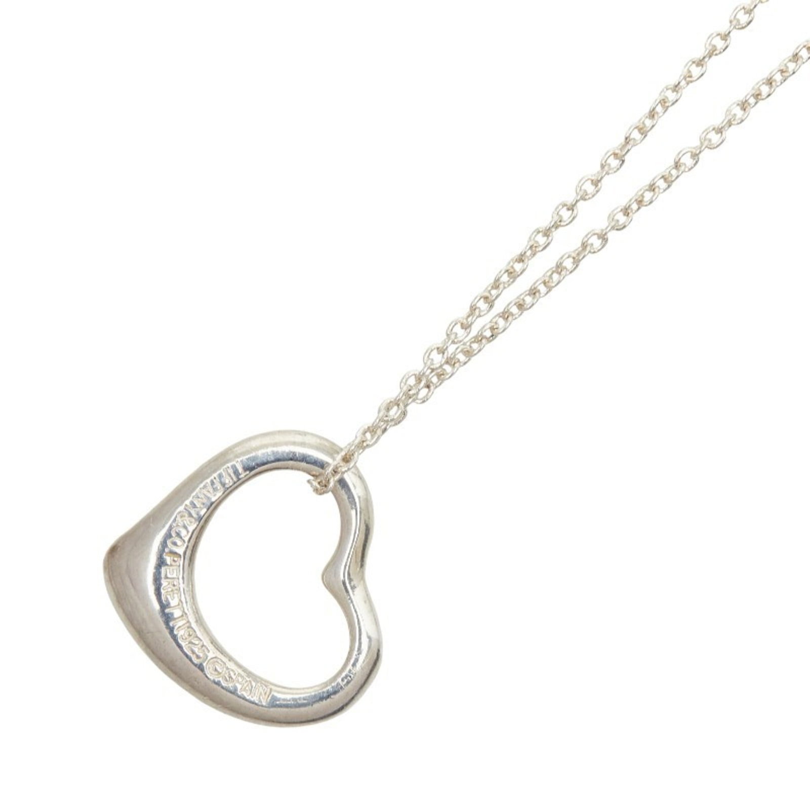 Tiffany & Co. Open Heart Necklace In 925 Sterling Silver For Women.: Tiffany & Co. Open Heart Necklace In 925 Sterling Silver For Women. Tiffany & Co.'s iconic Open Heart Necklace shines in sterling silver, its classic design timeless and elegant. With a 40cm adjustabl