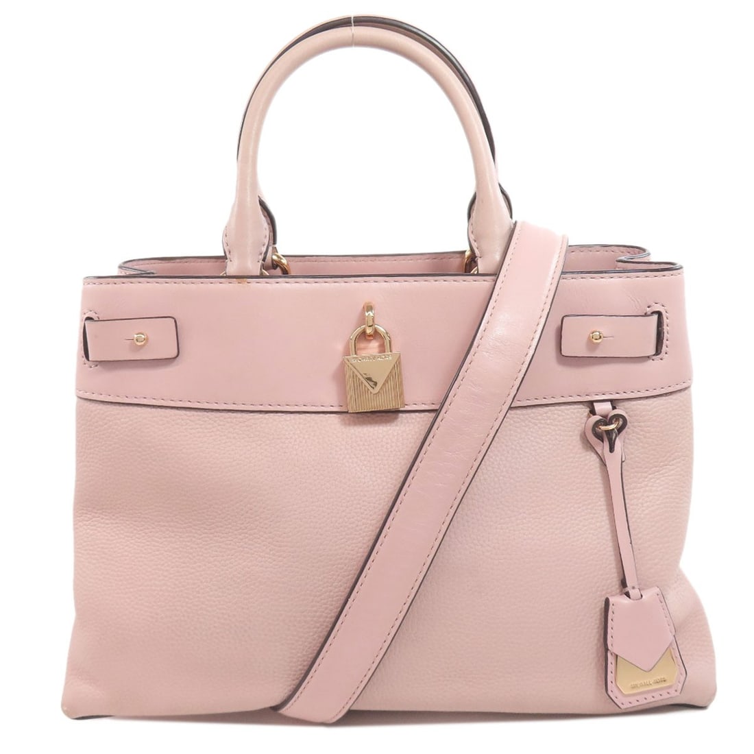 Michael Kors Handbag Leather: Michael Kors Handbag Leather Pink leather handbag from Michael Kors. The bag features a distinctive exterior color and is made of high-quality leather. A notable aspect of this item is its association