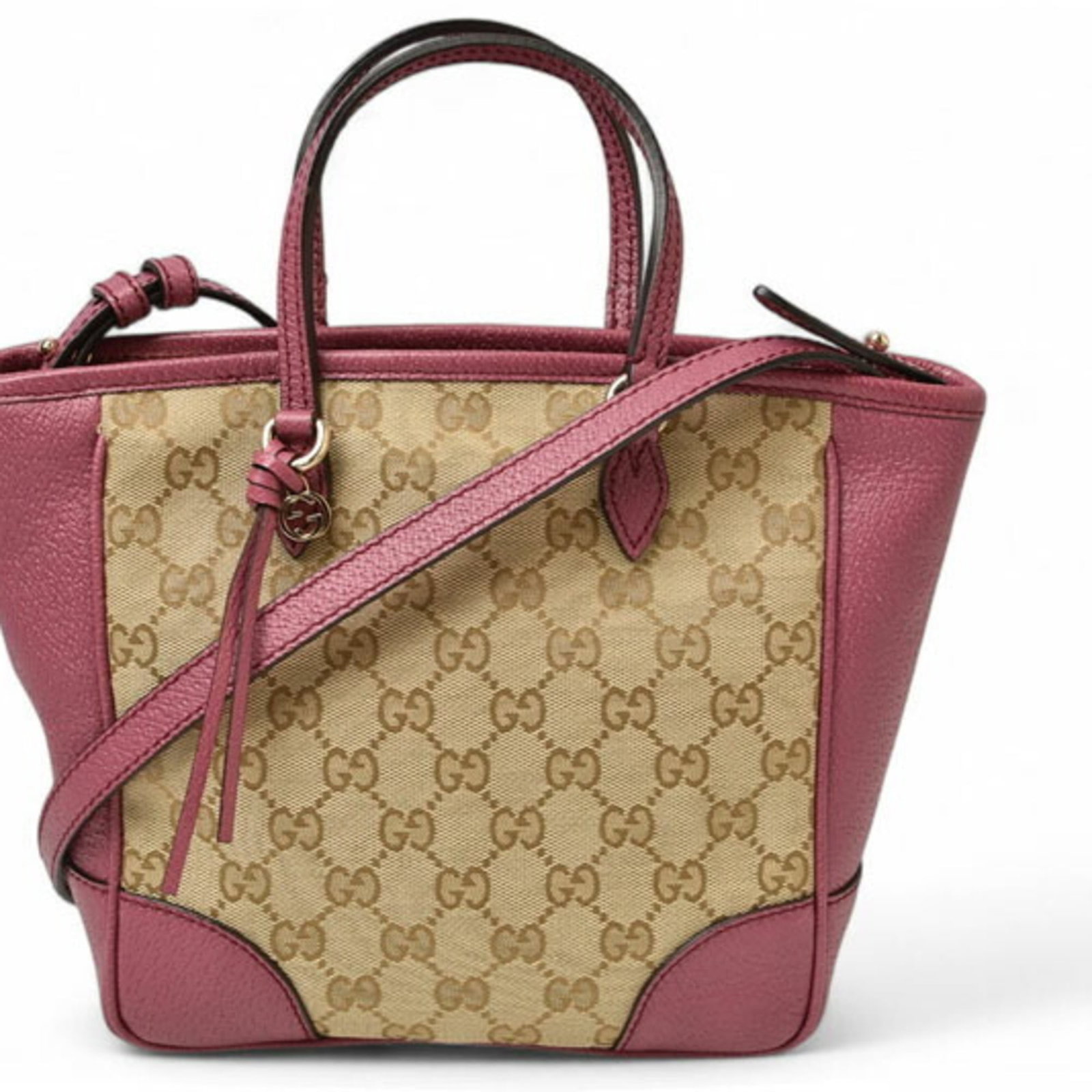 Gucci Handbag Shoulder Bag Gg Canvas Leather: Gucci Handbag Shoulder Bag Gg Canvas Leather Gucci's iconic canvas leather shoulder bag boasts a timeless beige and pink color combination. Made from high-quality Gg Canvas and adorned with premium