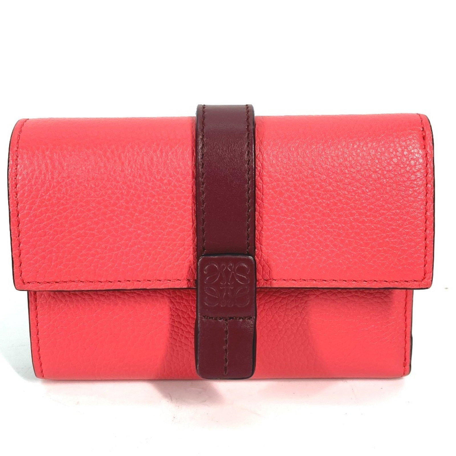 Loewe Wallet (Tri-Fold) Leather: Loewe Wallet (Tri-Fold) Leather Tri-fold Loewe wallet in brown and pink leather, offering a classic and stylish design. Made from high-quality leather, this wallet features a timeless tri-fold layout 