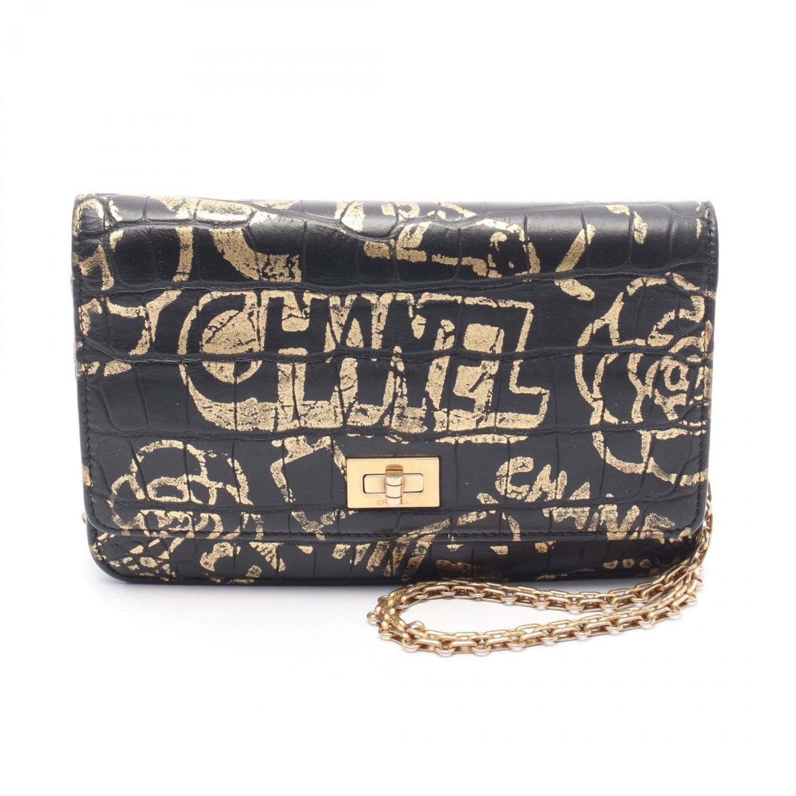 Chanel Shoulder Bag Leather: Chanel Shoulder Bag Leather Black leather Chanel shoulder bag with gold accents. This used bag features a few traces of usage and some scratches/dirt, but remains in very good condition. Its classic d