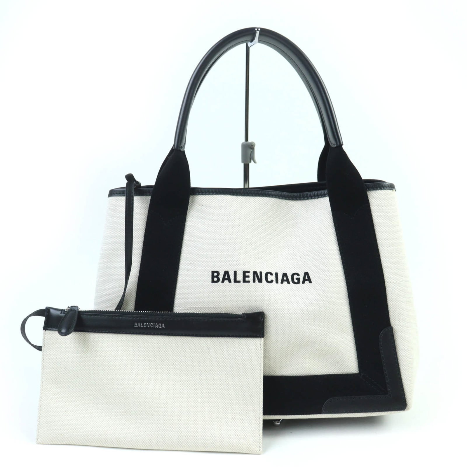Balenciaga Handbag Cotton Canvas: Balenciaga Handbag Cotton Canvas Cotton canvas Balenciaga handbag in beige with open closure, measuring 23cm x 35cm x 17cm. Features a sturdy handle length of 44cm and shows some minor signs of usage,