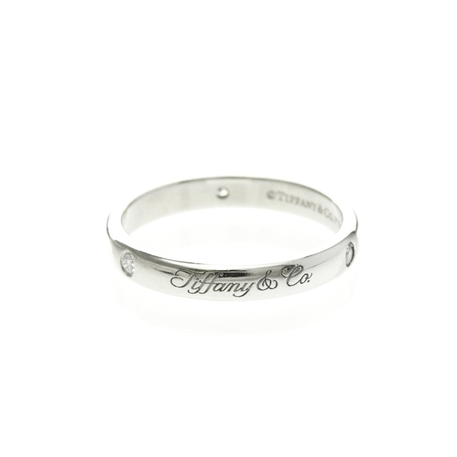 Tiffany Wedding Ring Platinum: Tiffany Wedding Ring Platinum Made from high-quality platinum metal, this Tiffany wedding ring boasts a sleek design with a 3mm diamond stone. The ring's silver tone and slender width make it a