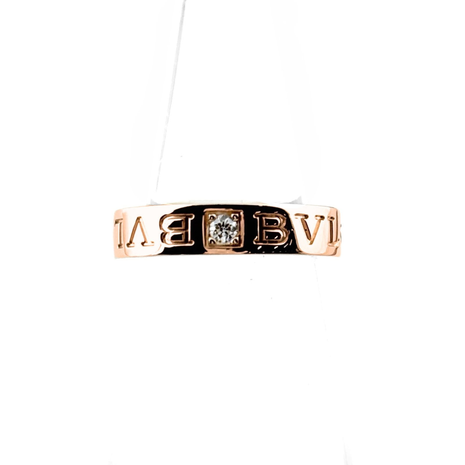 Bvlgari Band Ring Pink Gold (18K): Bvlgari Band Ring Pink Gold (18K) Pink gold (18K) Bvlgari band ring with a diamond stone, this elegant piece features a classic design. The 3.5 size fits comfortably on most women's wrists, weighing