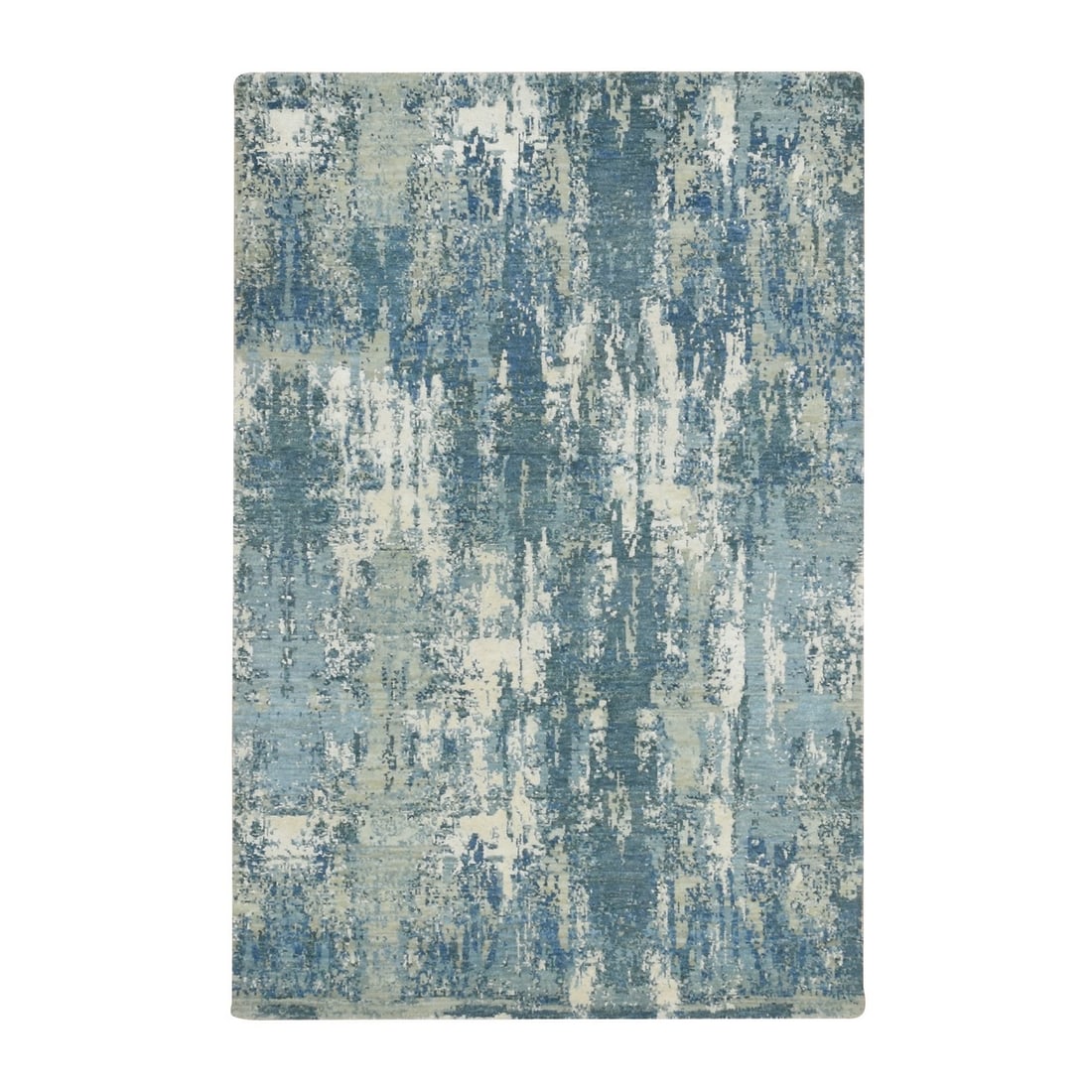 Blue Hand Knotted Silk Wool Rug 41x62 Inches: Blue Hand Knotted Silk Wool Rug 41x62 Inches This stunning Blue Hand Knotted Silk Wool Rug boasts an intricate Oriental Regional Design in a rich blue field, created using traditional Indian technique
