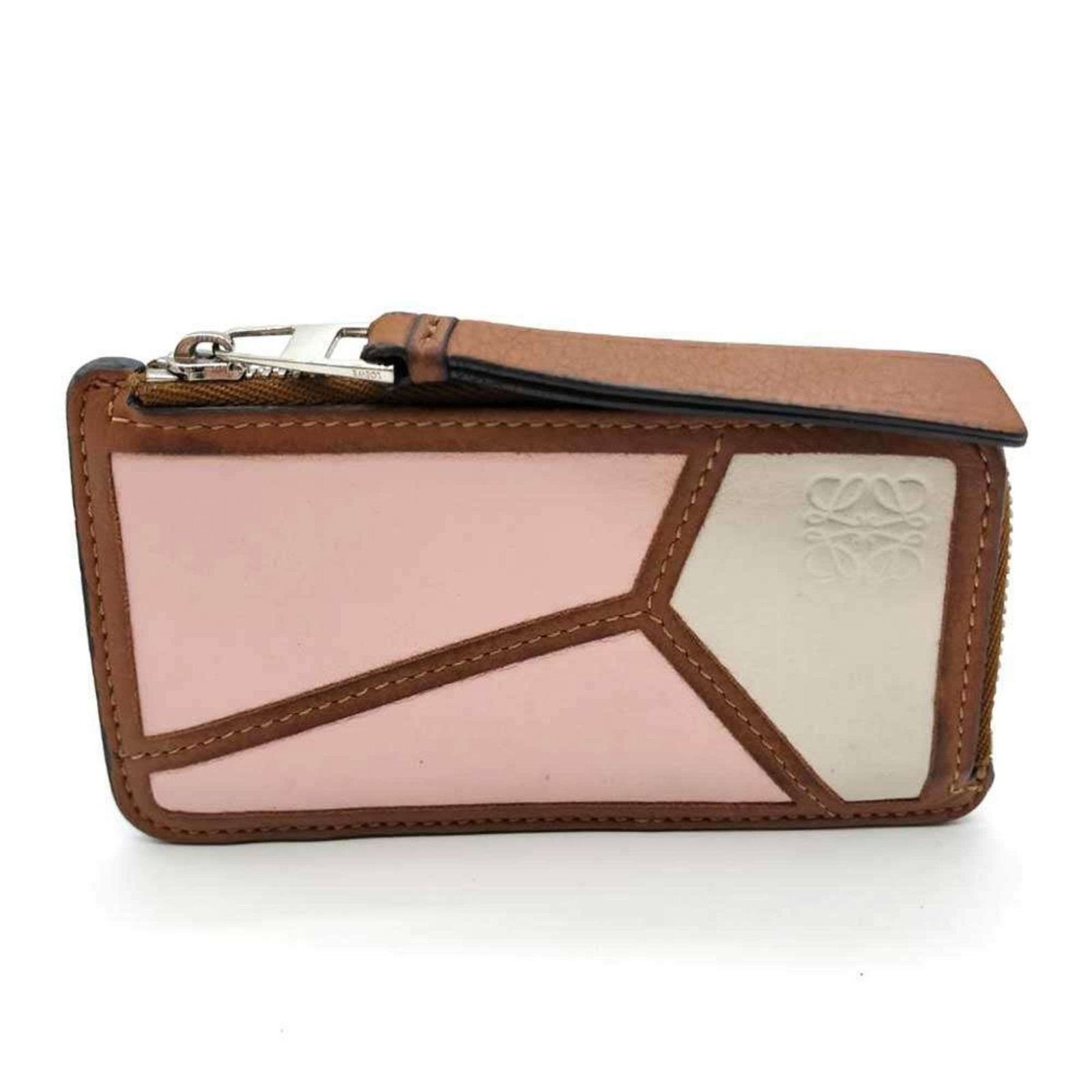 Loewe Coin Purse/Coin Case Leather: Loewe Coin Purse/Coin Case Leather The Loewe Coin Purse/Coin Case Leather is a stylish and functional accessory featuring high-quality pink leather. With its classic design and compact size, this coin