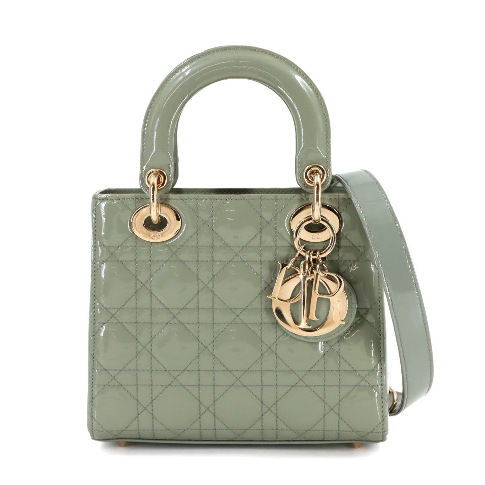Christian Dior Handbag Patent Leather: Christian Dior Handbag Patent Leather Patent leather finish adds a touch of sophistication to this Christian Dior handbag. The green color provides a unique and stylish twist on classic designs, while