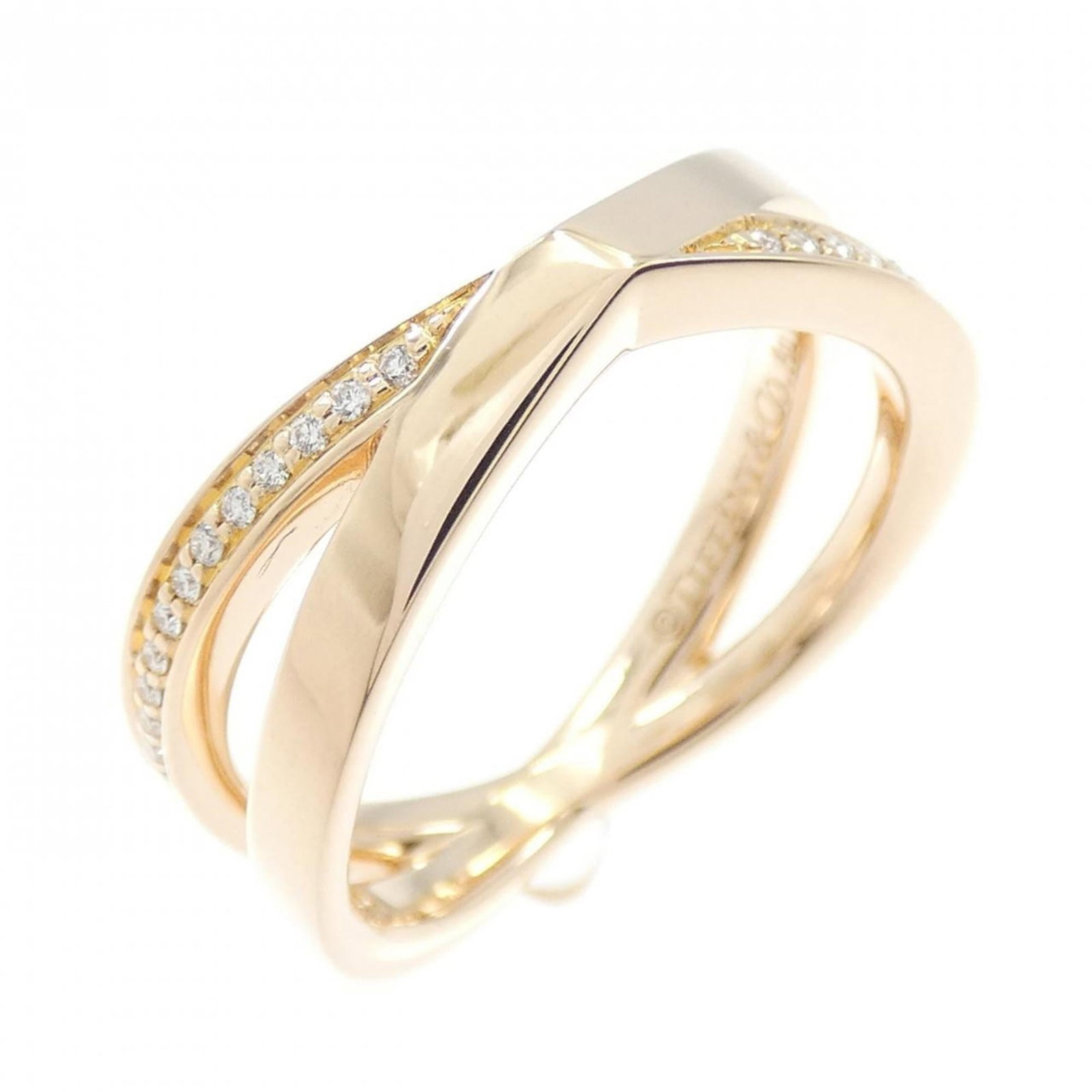 Tiffany Band Ring Pink Gold (18K): Tiffany Band Ring Pink Gold (18K) Pink Gold (18K) Tiffany Band Ring with a Diamond Accent. This lovely ring features a band adorned with a diamond, crafted from high-quality pink gold. In excellent co