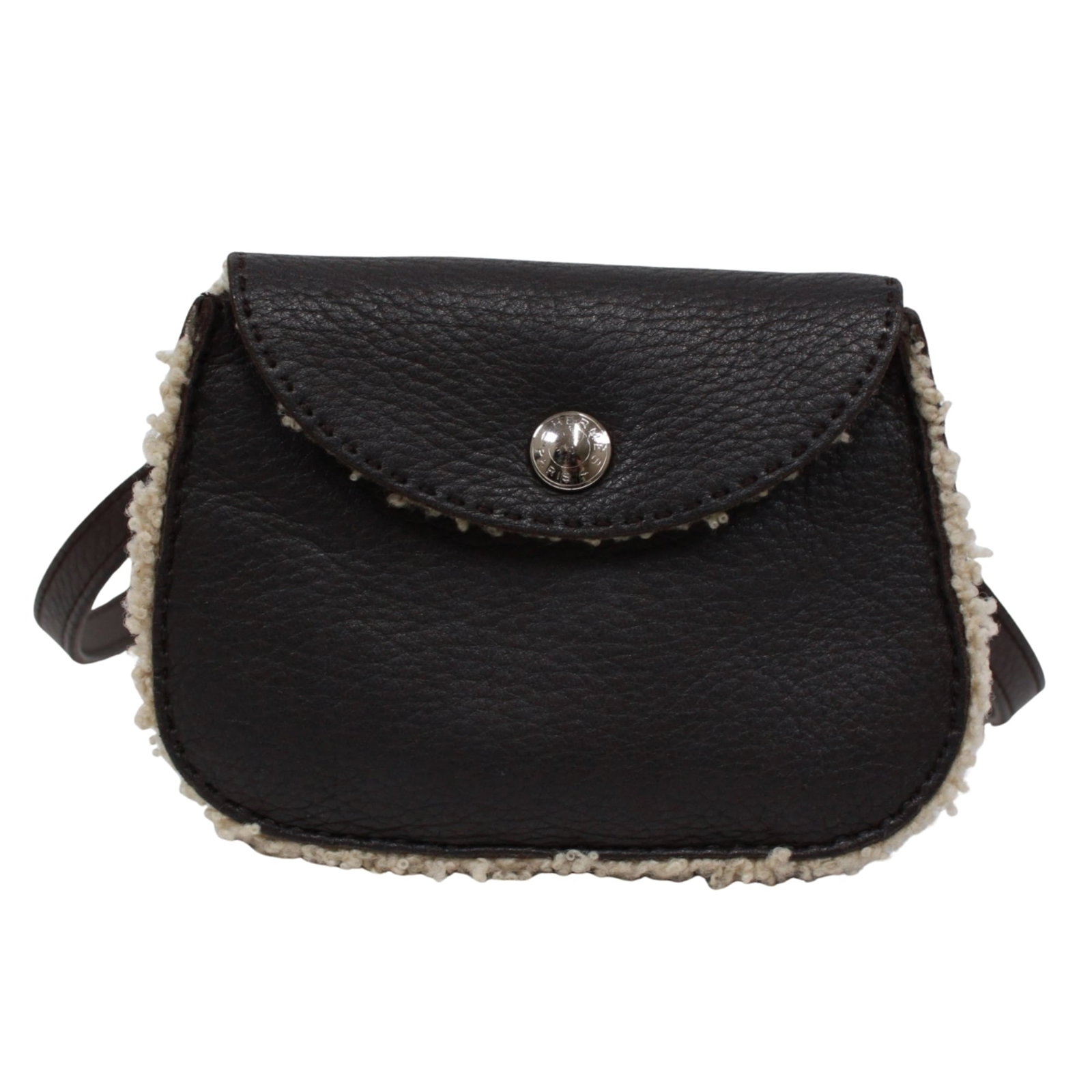 Hermes Fanny Pack Pochette Taurillon Clemence Leather Leather: Hermes Fanny Pack Pochette Taurillon Clemence Leather Leather Dark Brown Taurillon Clemence Leather Fanny Pack Pochette from Hermes features Mouton trim and a classic design. Made from high-quality Ta