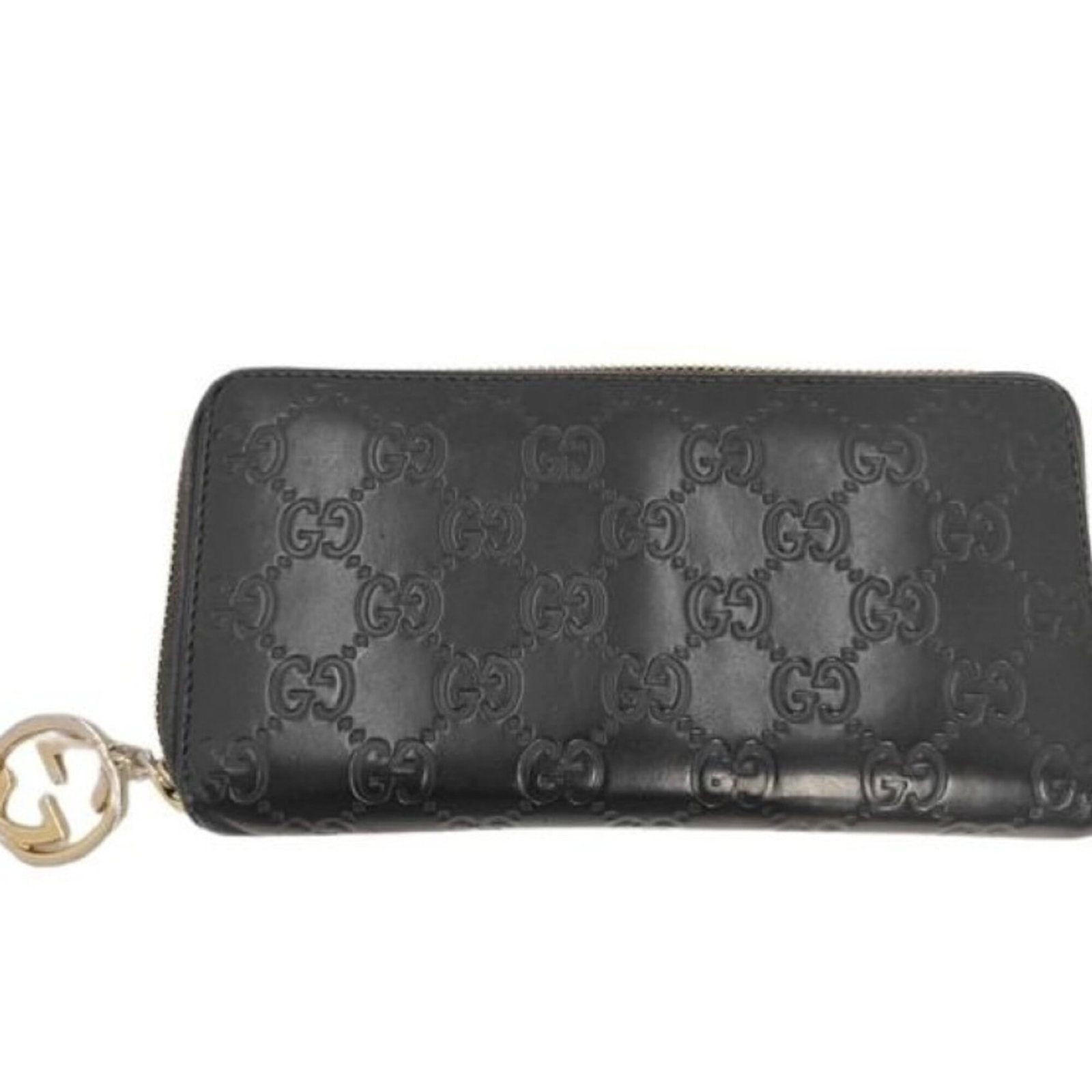 Gucci Long Wallet (Bi-Fold) Leather: Gucci Long Wallet (Bi-Fold) Leather This Gucci long wallet features a sleek bi-fold design with black leather construction. With its classic size and timeless style, it remains a versatile accessory