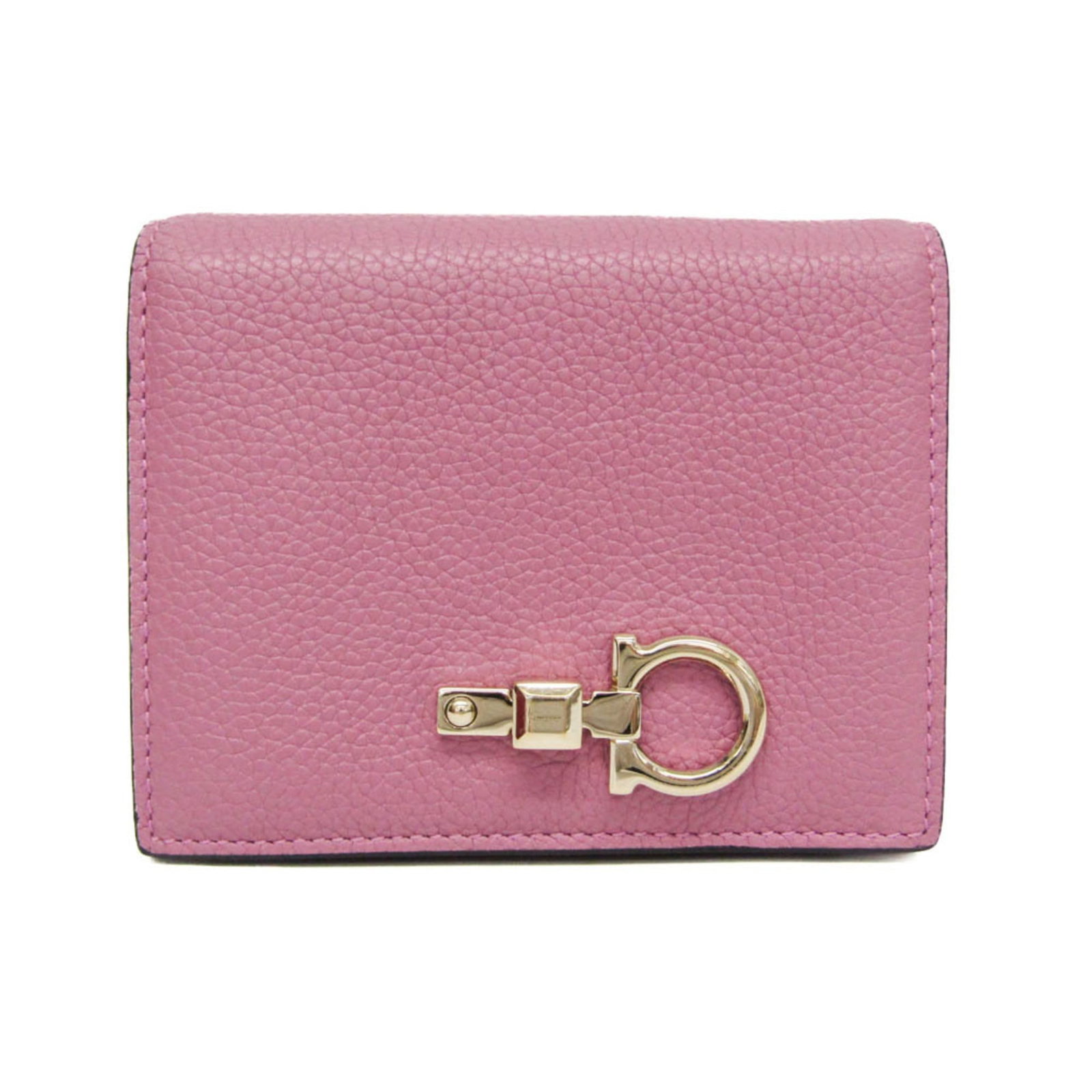 Salvatore Ferragamo Wallet (Bi-Fold) Leather: Salvatore Ferragamo Wallet (Bi-Fold) Leather This Salvatore Ferragamo bi-fold leather wallet features a classic design with a snap fastener closure and multiple pockets for organization. The pink leat