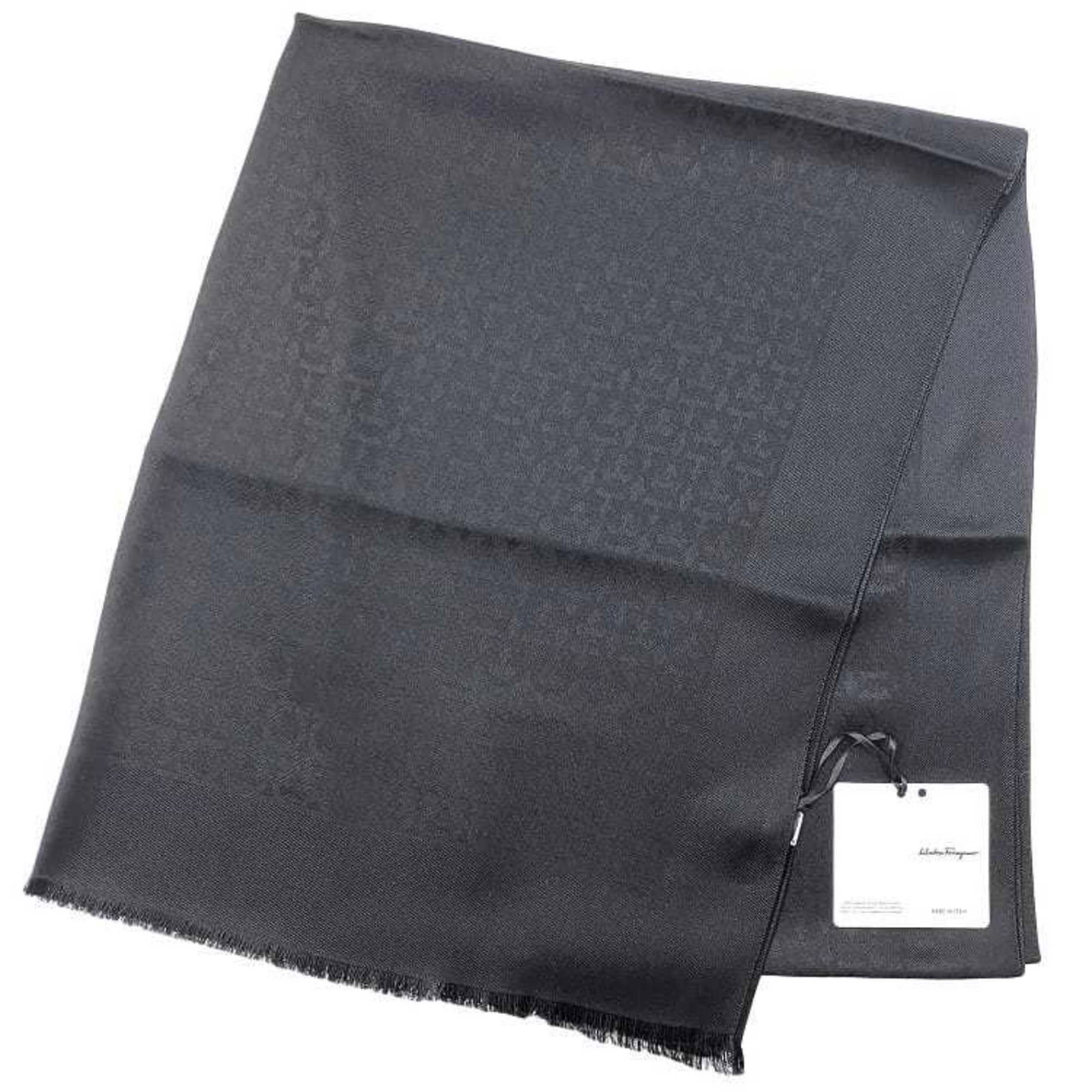 Salvatore Ferragamo Stole Silk 75% Wool 25%: Salvatore Ferragamo Stole Silk 75% Wool 25% Silk and wool blend in this Salvatore Ferragamo stole, measuring 1.8m x 70cm. The black color and high-quality materials make for a luxurious accessory.
