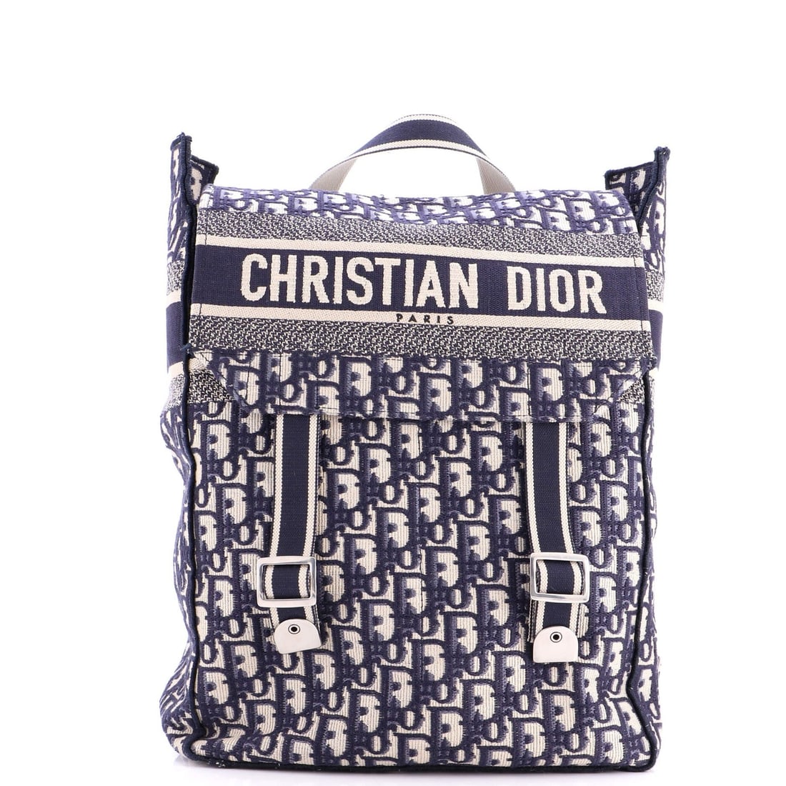 Christian Dior Mini Flap Oblique Canvas Backpack: Christian Dior Mini Flap Oblique Canvas Backpack The Christian Dior Mini Flap Oblique Canvas Backpack boasts sleek, oblique lines and a vibrant blue canvas exterior. With its compact size and classic 