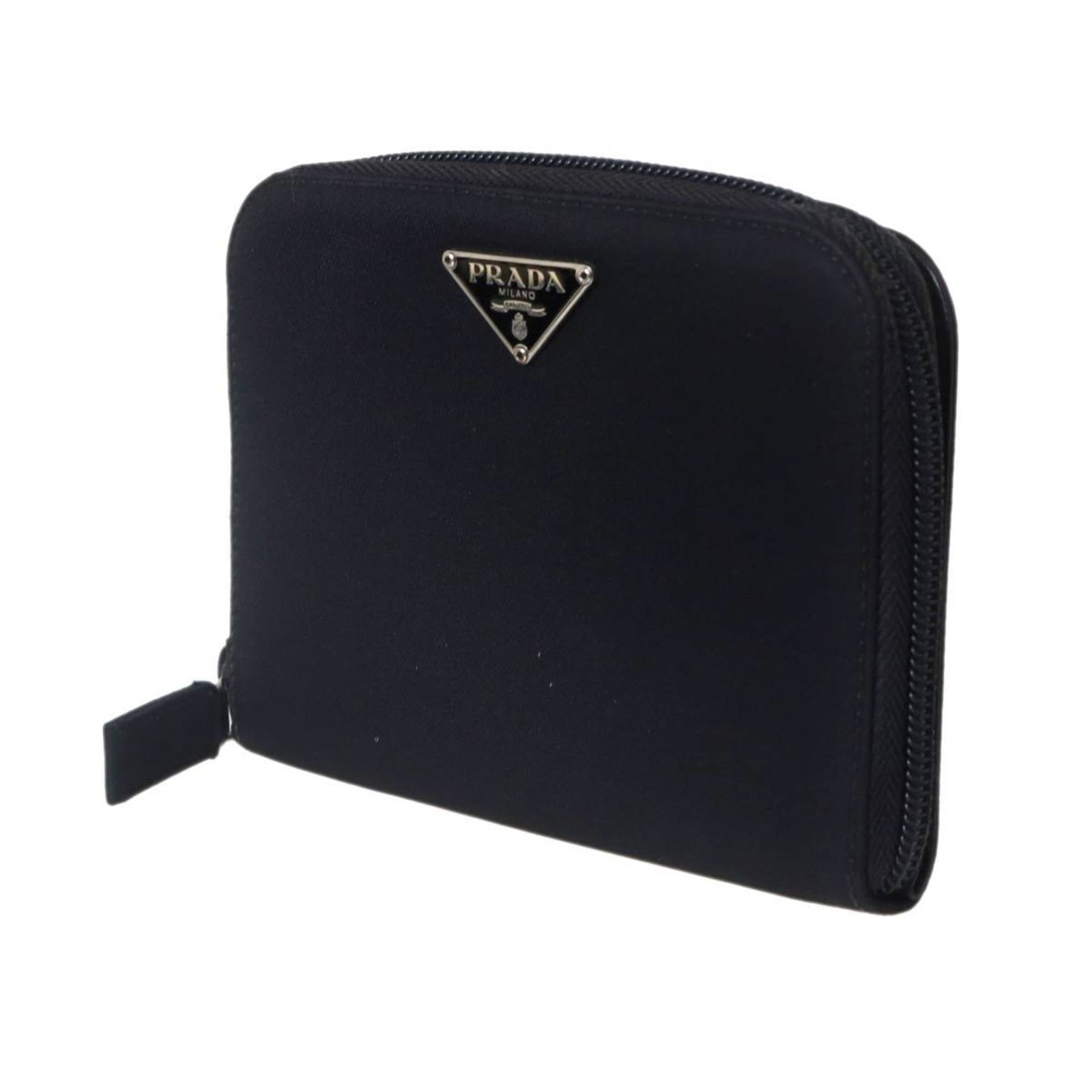 Prada Wallet (Bi-Fold) Nylon: Prada Wallet (Bi-Fold) Nylon The Prada Wallet (Bi-Fold) Nylon is a versatile and stylish accessory made from durable nylon material. Its sleek black design measures 10.5cm x 13cm x 2cm, making it a