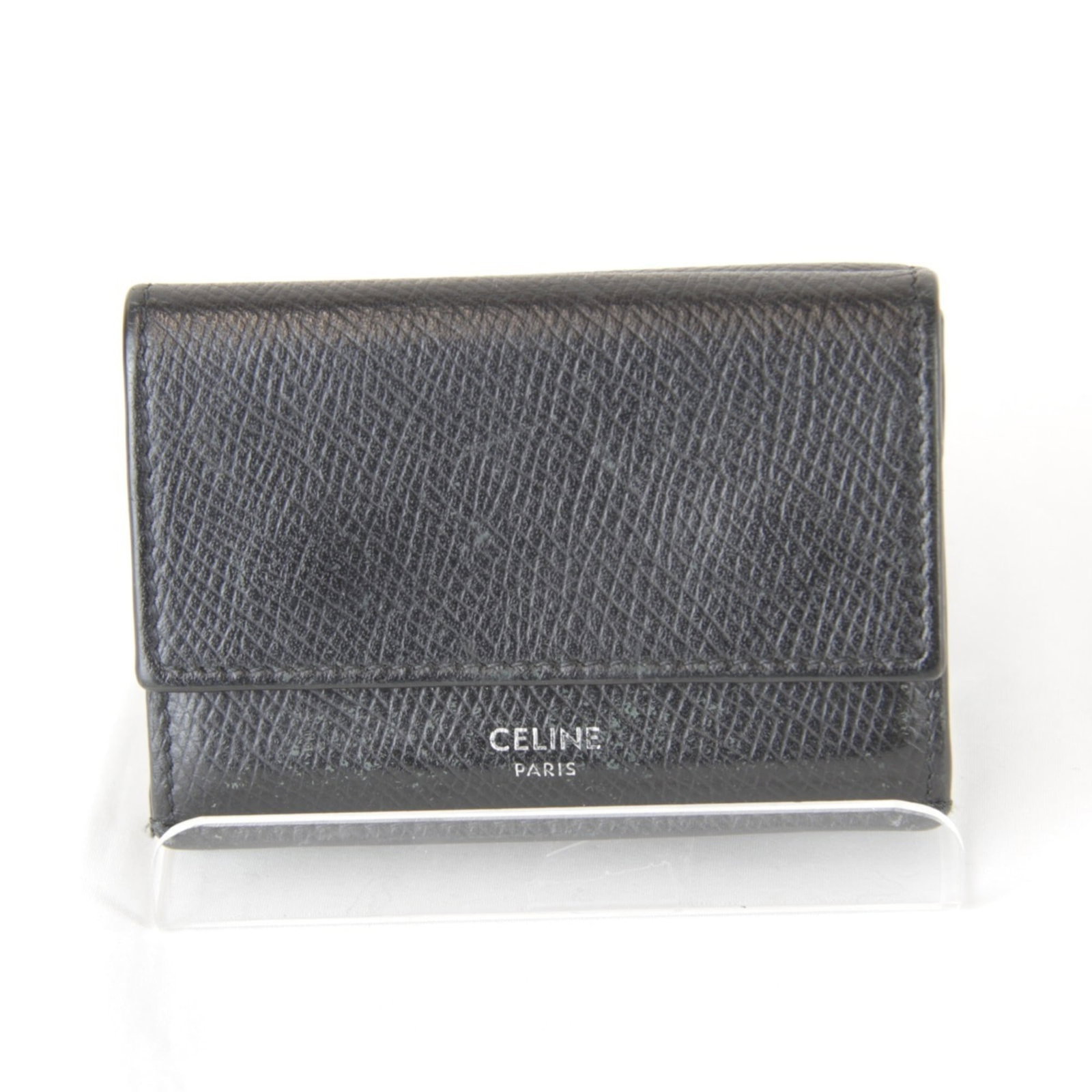 Celine Wallet (Tri-Fold) Leather: Celine Wallet (Tri-Fold) Leather Tri-fold leather wallet from Celine, featuring a classic design. The black leather has some traces of usage and minor damages, but remains in acceptable condition for 