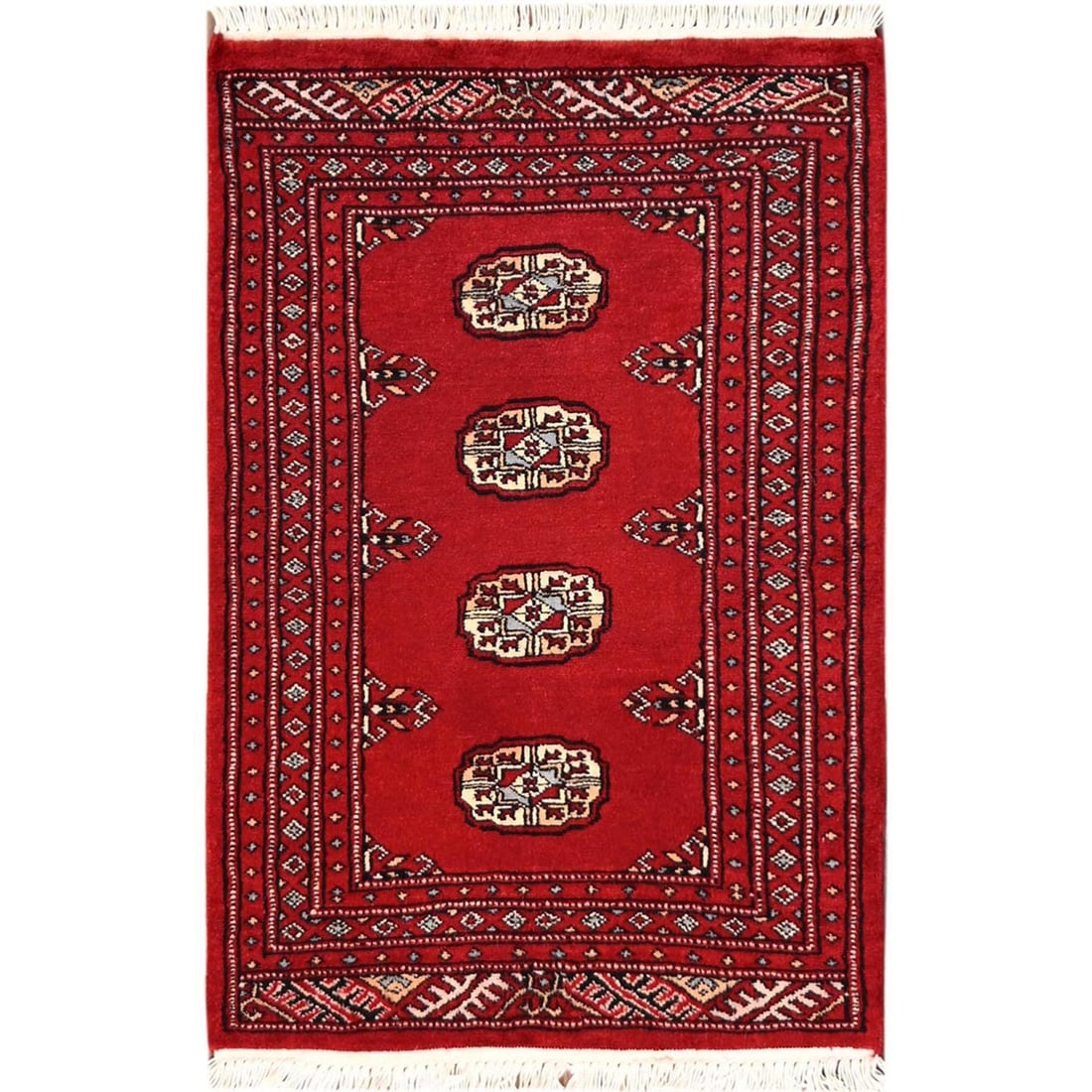 Red Hand Knotted Wool Rug 2 3 Princess Bokara Tribal: Red Hand Knotted Wool Rug 2 3 Princess Bokara Tribal The Red Hand Knotted Wool Rug boasts an eye-catching geometric pattern in bold red hues, set against a rich ivory background. Hand-knotted with hig