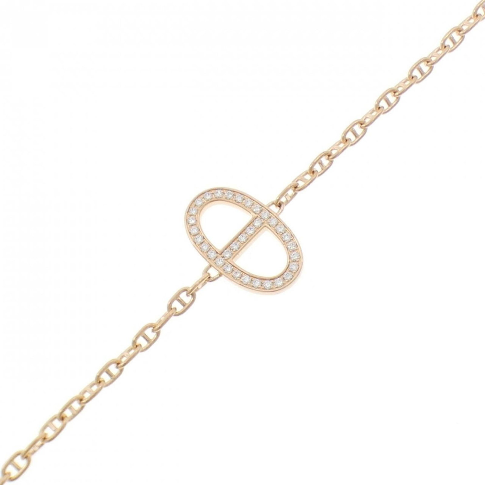 Hermes Charm Bracelet Pink Gold (18K): Hermes Charm Bracelet Pink Gold (18K) Pink Gold (18K) Charm Bracelet from Hermes boasts a delicate 17.5cm length, adorned with diamonds. The bracelet showcases a few traces of usage, some scratches / 