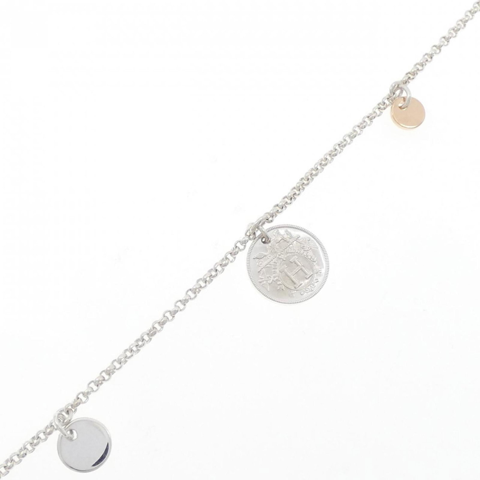 Hermes Charm Bracelet Pink Gold (18K) Silver 925: Hermes Charm Bracelet Pink Gold (18K) Silver 925 Pink Gold (18K) and Silver 925 come together in this elegant Hermes Charm Bracelet. Measuring 16cm in length, this lovely piece boasts a nice condition