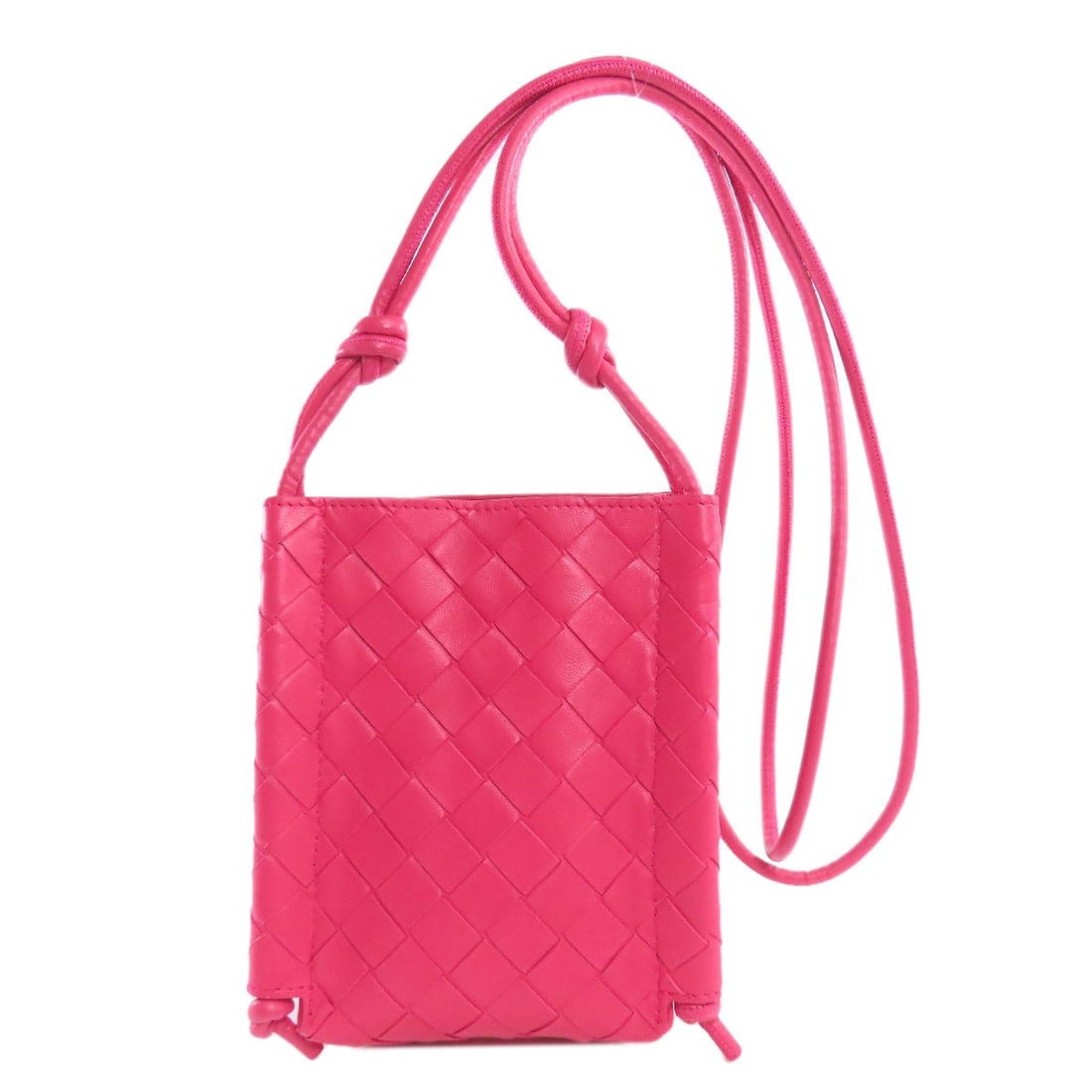 Veneta Intrecciato Calf Bag: Veneta Intrecciato Calf Bag The Veneta Intrecciato Calf Bag features a striking pink exterior made from calf leather, showcasing the iconic interlocking knot pattern characteristic of Bottega Veneta's