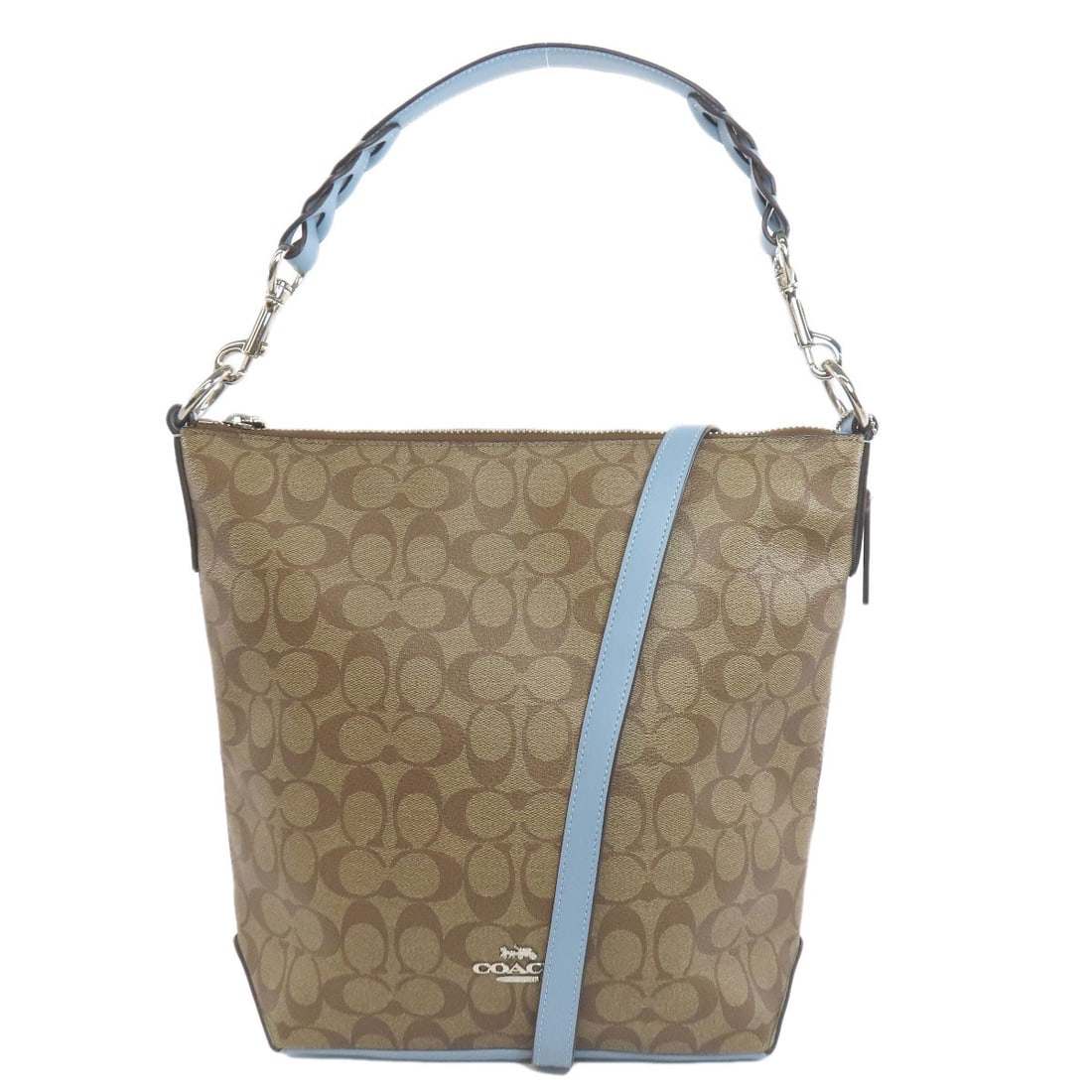 Signature 2way shoulder bag pvc coach f31477: Signature 2way shoulder bag pvc coach f31477 This COACH shoulder bag features a unique PVC exterior with a striking brown and light blue color combination. The bag's design showcases its signature 2-w