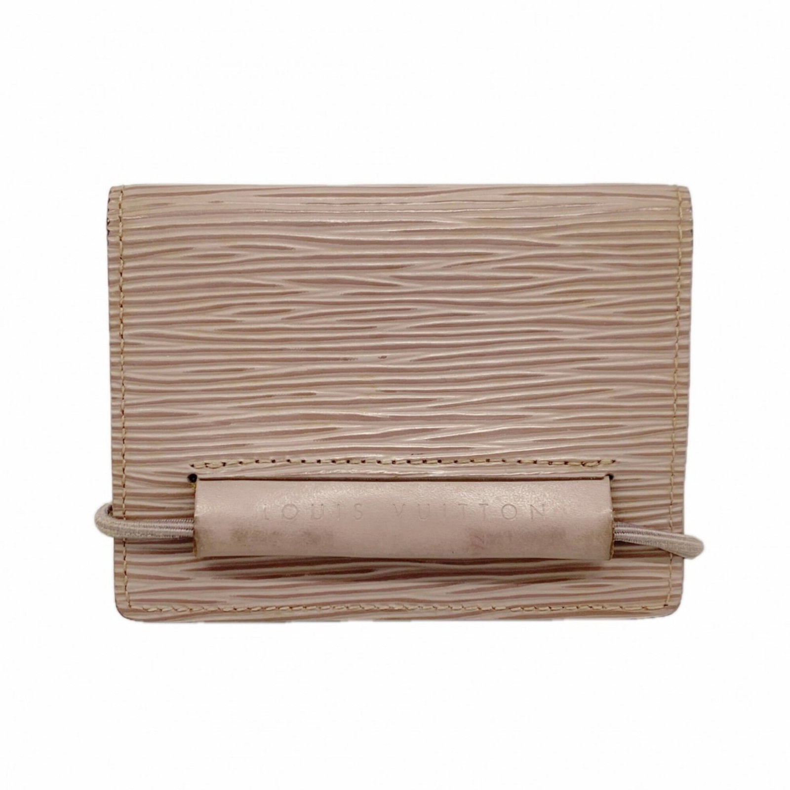 Louis Vuitton Card Case: Louis Vuitton Card Case This Lilac Louis Vuitton card case features a subtle, pastel hue and bears signs of previous use. The case has scratches and dirt, indicating it's been handled, but remains in
