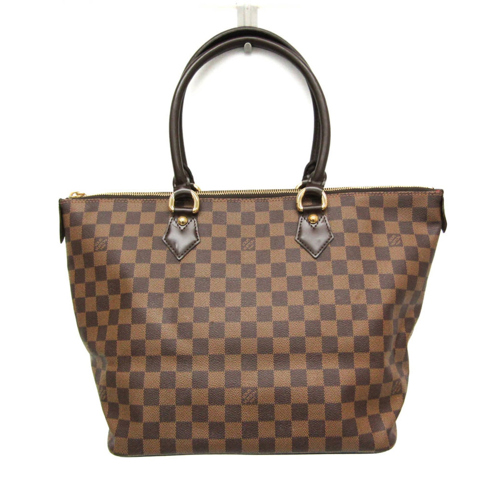 Louis Vuitton Handbag Damier Canvas: Louis Vuitton Handbag Damier Canvas Damier Canvas handbag from Louis Vuitton features iconic Ebene color and gold hardware. The bag boasts an open pocket, phone holder, and interior space for