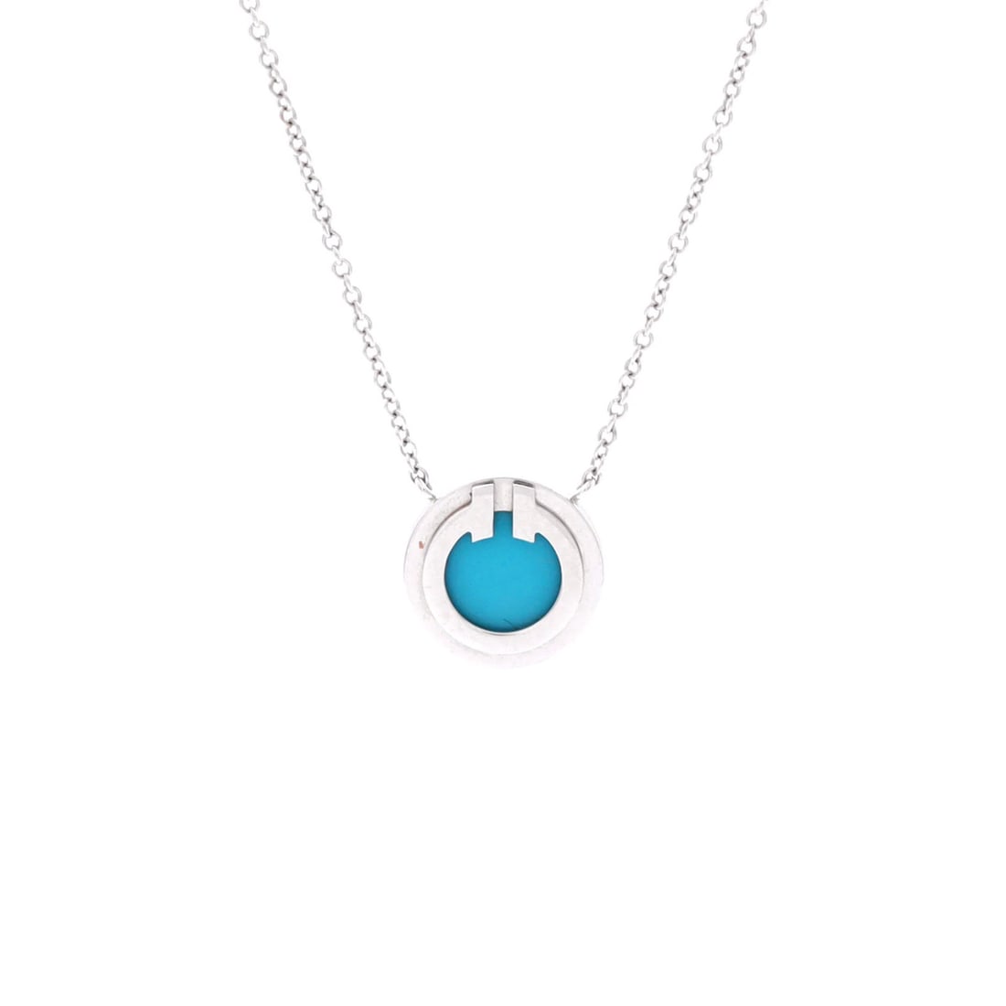 Tiffany Circle Pendant Necklace Turquoise 18K White Gold Small: Tiffany Circle Pendant Necklace Turquoise 18K White Gold Small The Tiffany Circle Pendant Necklace in 18K white gold features a stunning turquoise stone, showcasing the beauty of this iconic design. T