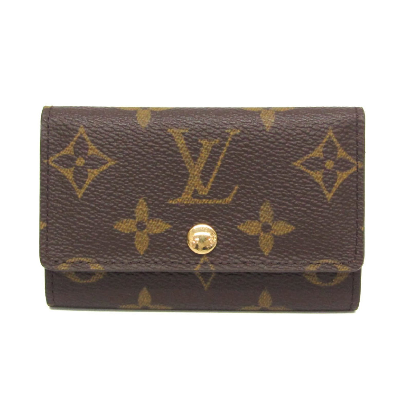 Louis Vuitton Keycase Monogram: Louis Vuitton Keycase Monogram The Louis Vuitton Keycase Monogram in brown features a classic snap closure and six key hooks. With its iconic monogram pattern, this stylish accessory has been used to 