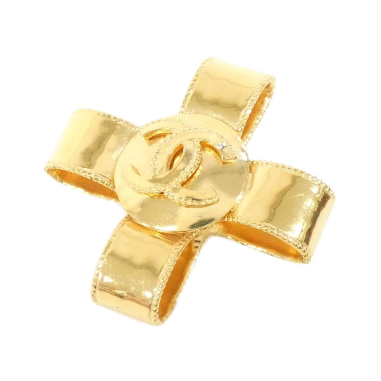 Chanel Brooch: Chanel Brooch Gold Chanel brooch in excellent condition, bearing a few minor scratches and signs of usage. Measuring 5.3cm x 5.3cm, this elegant piece showcases the iconic Chanel style. A used item wi