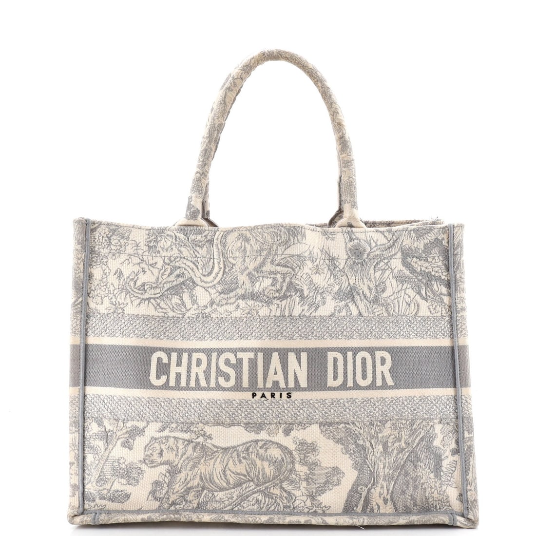 Christian Dior Medium Canvas Embroidered Book Tote: Christian Dior Medium Canvas Embroidered Book Tote Gray canvas tote bag with embroidered design in medium size. This Christian Dior Book Tote features a classic style with subtle embroidery, measuring