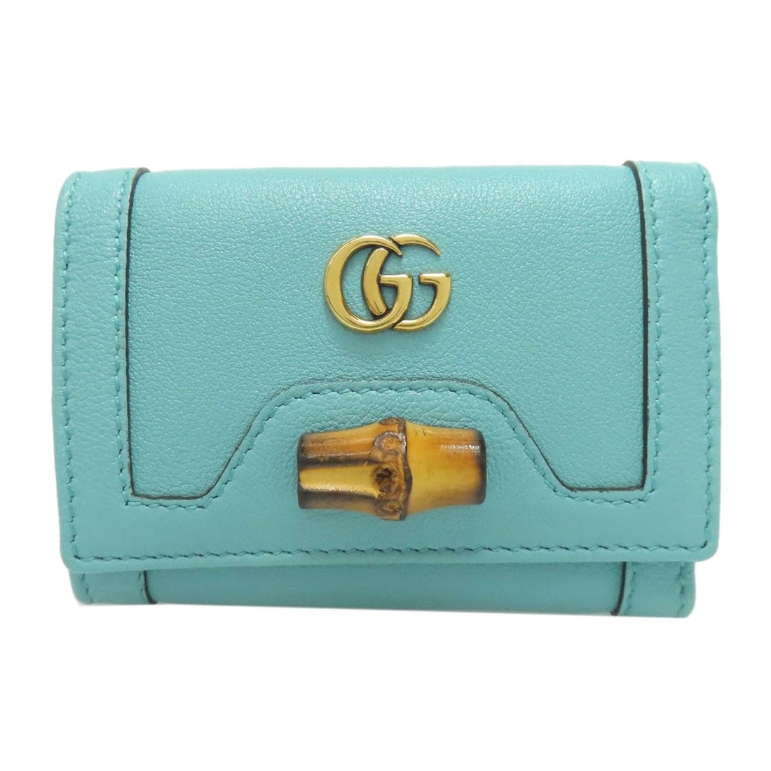 Diana Compact Wallet Bifold Gucci 658633 With Pocket Coin Bamboo: Diana Compact Wallet Bifold Gucci 658633 With Pocket Coin Bamboo The Diana Compact Wallet Bifold Gucci features a sleek light blue design with a bifold structure and coin pocket for added convenience.
