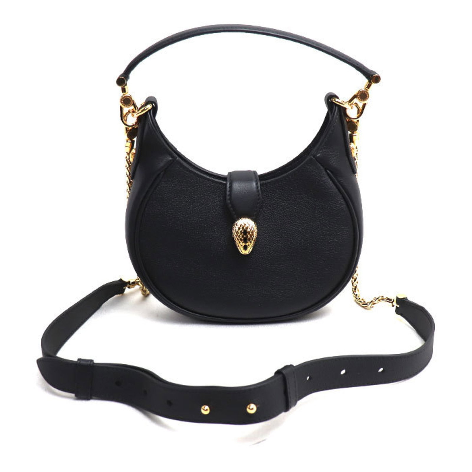 Bvlgari Shoulder Bag Leather: Bvlgari Shoulder Bag Leather The Bvlgari Shoulder Bag Leather boasts classic elegance with its sleek black calfskin design. With a few subtle signs of wear, this pre-owned bag still exudes sophisticat