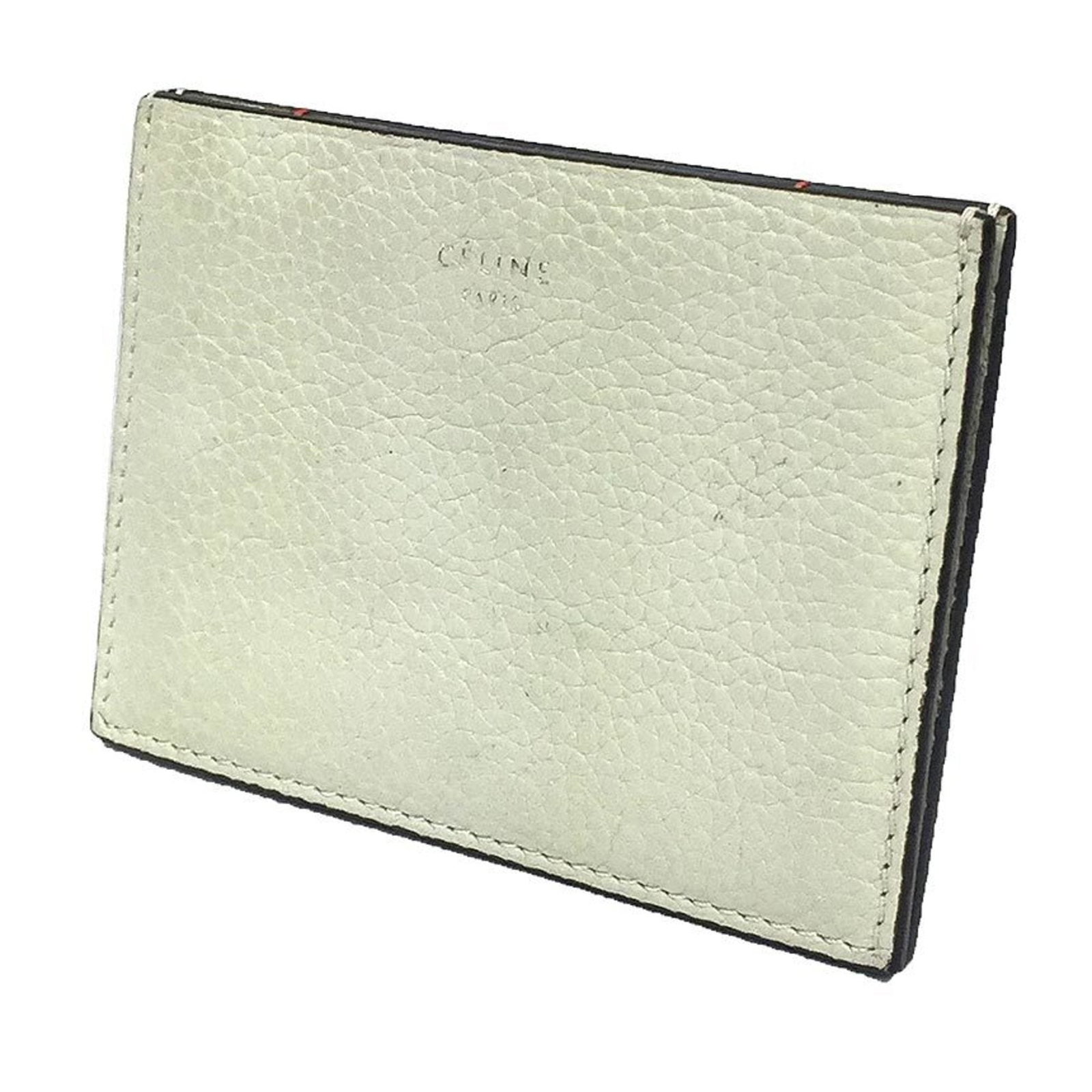 Celine Card Case Leather: Celine Card Case Leather Light gray Celine card case made from high-quality leather, featuring a subtle sheen and slight scratches from normal use. The material has developed some minor imperfections 